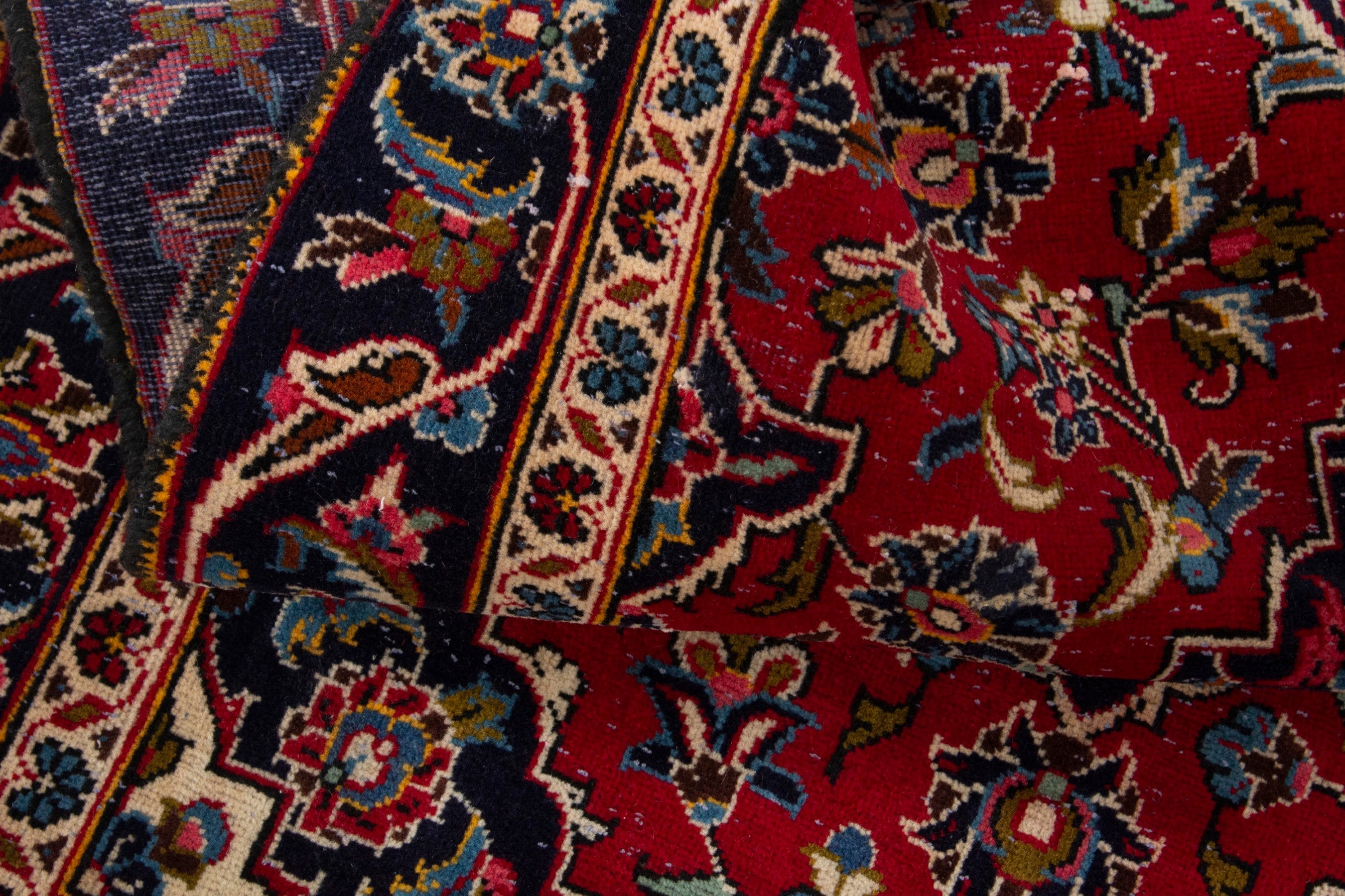 Persian Kashan accent rug in deep red and navy, view 16 of 17