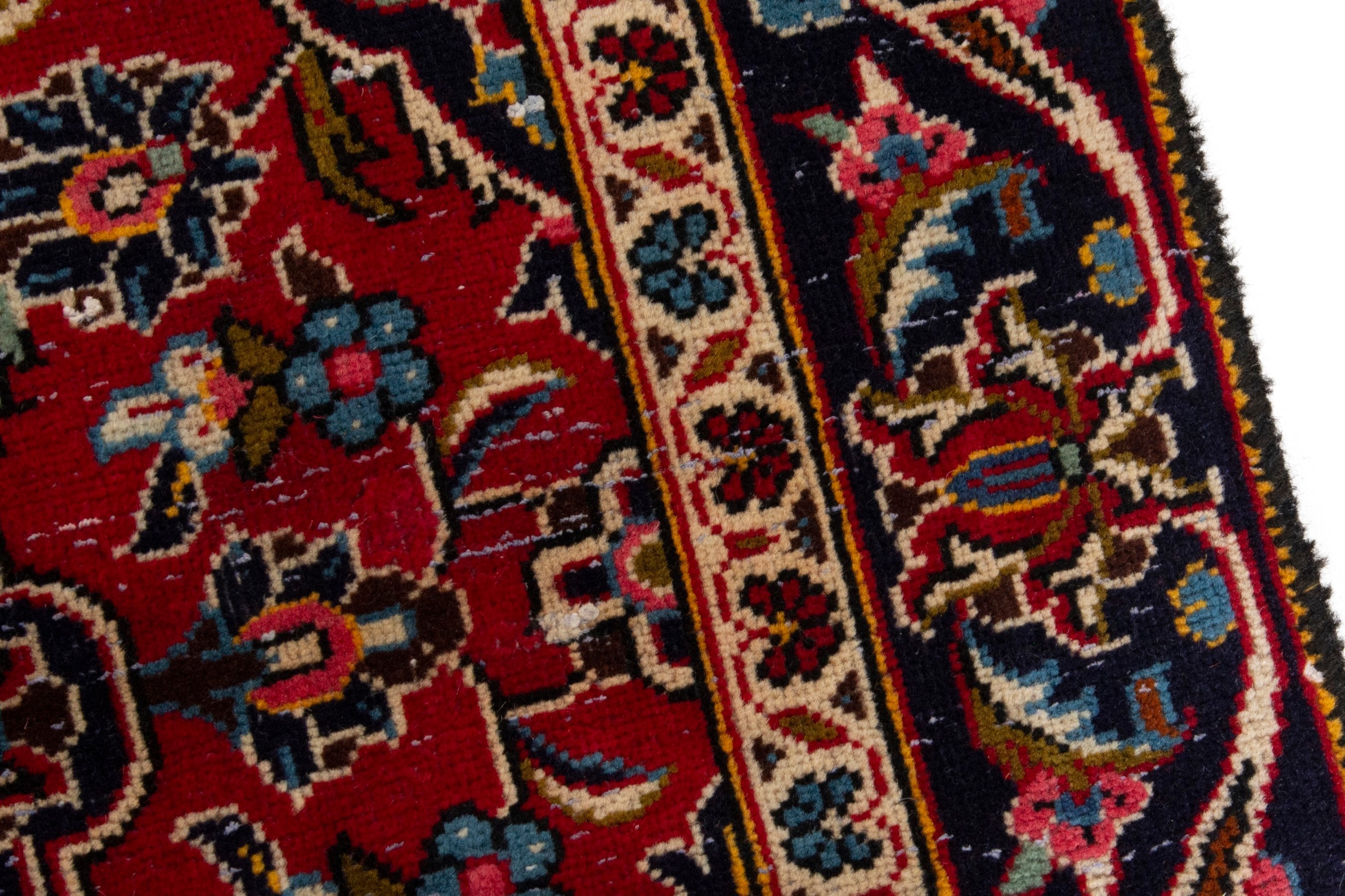 Persian Kashan accent rug in deep red and navy, view 7 of 17