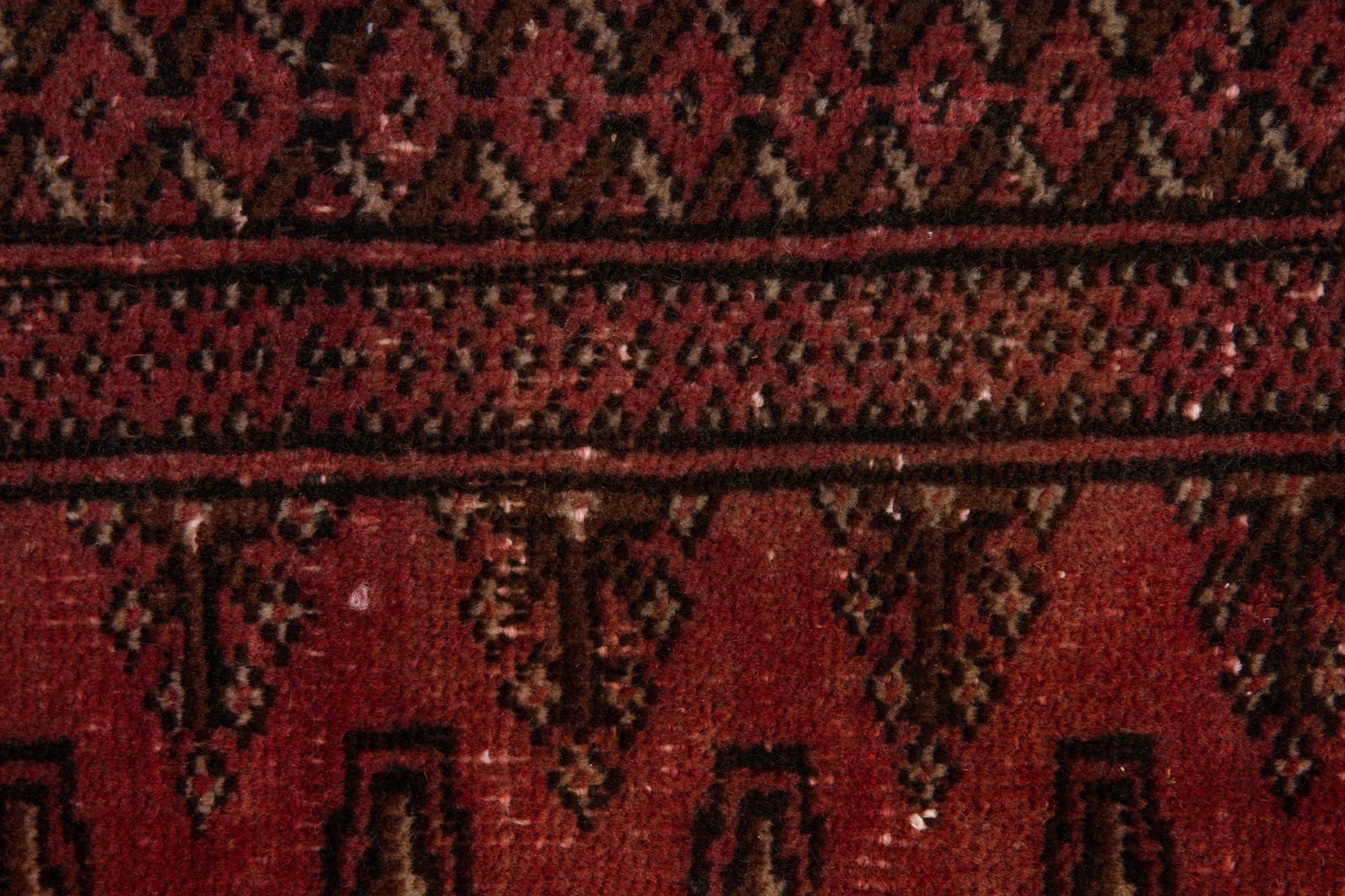 Persian Torkaman accent rug in deep red and dark brown, view 12 of 17
