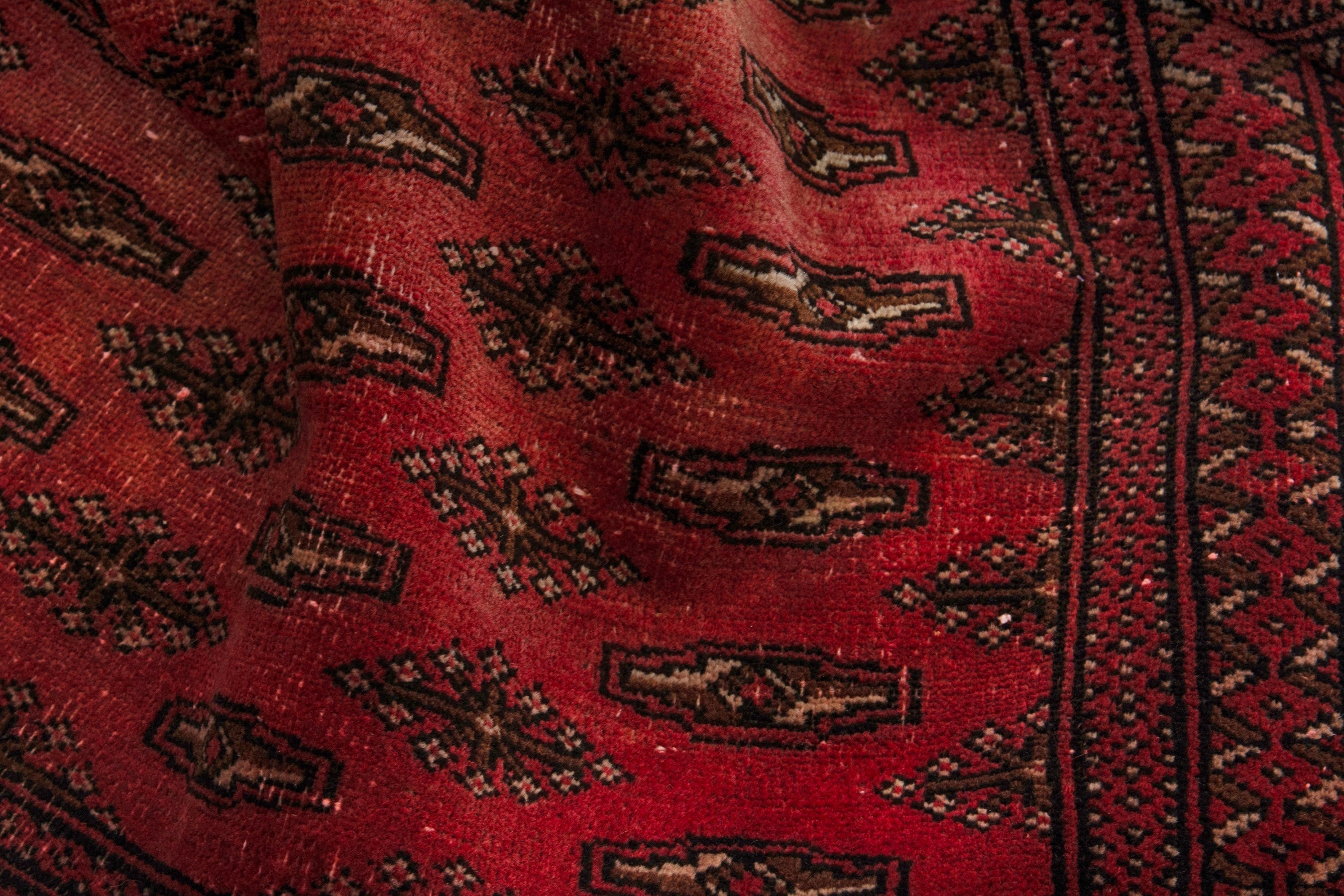 Persian Torkaman accent rug in deep red and dark brown, view 14 of 17
