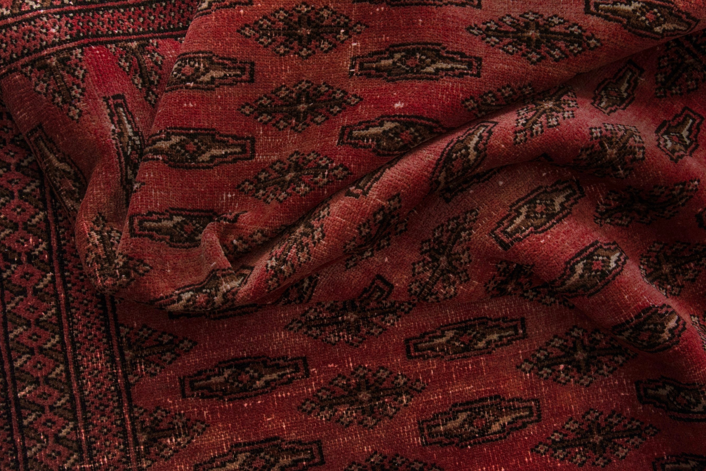 Persian Torkaman accent rug in deep red and dark brown, view 15 of 17