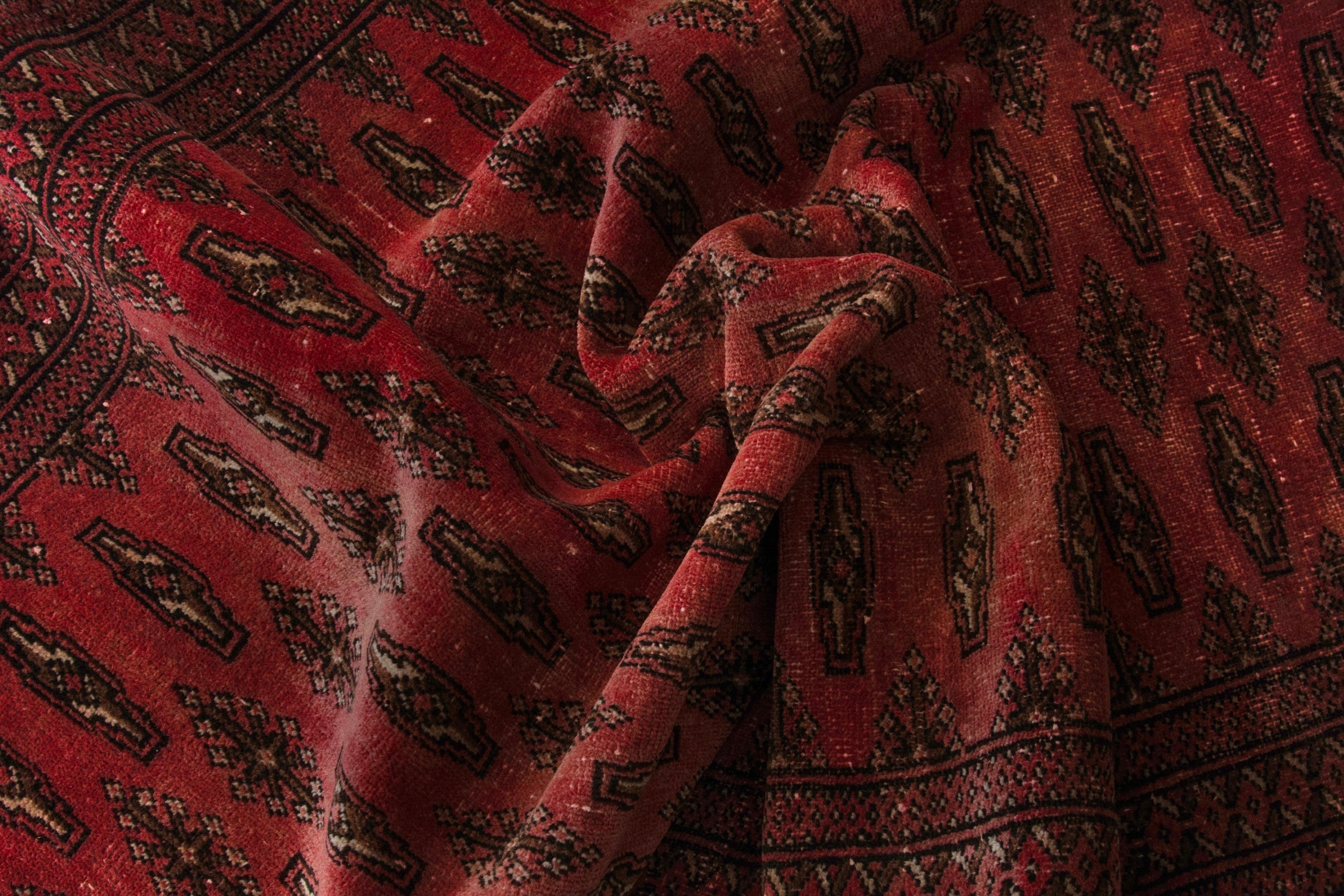 Persian Torkaman accent rug in deep red and dark brown, view 16 of 17