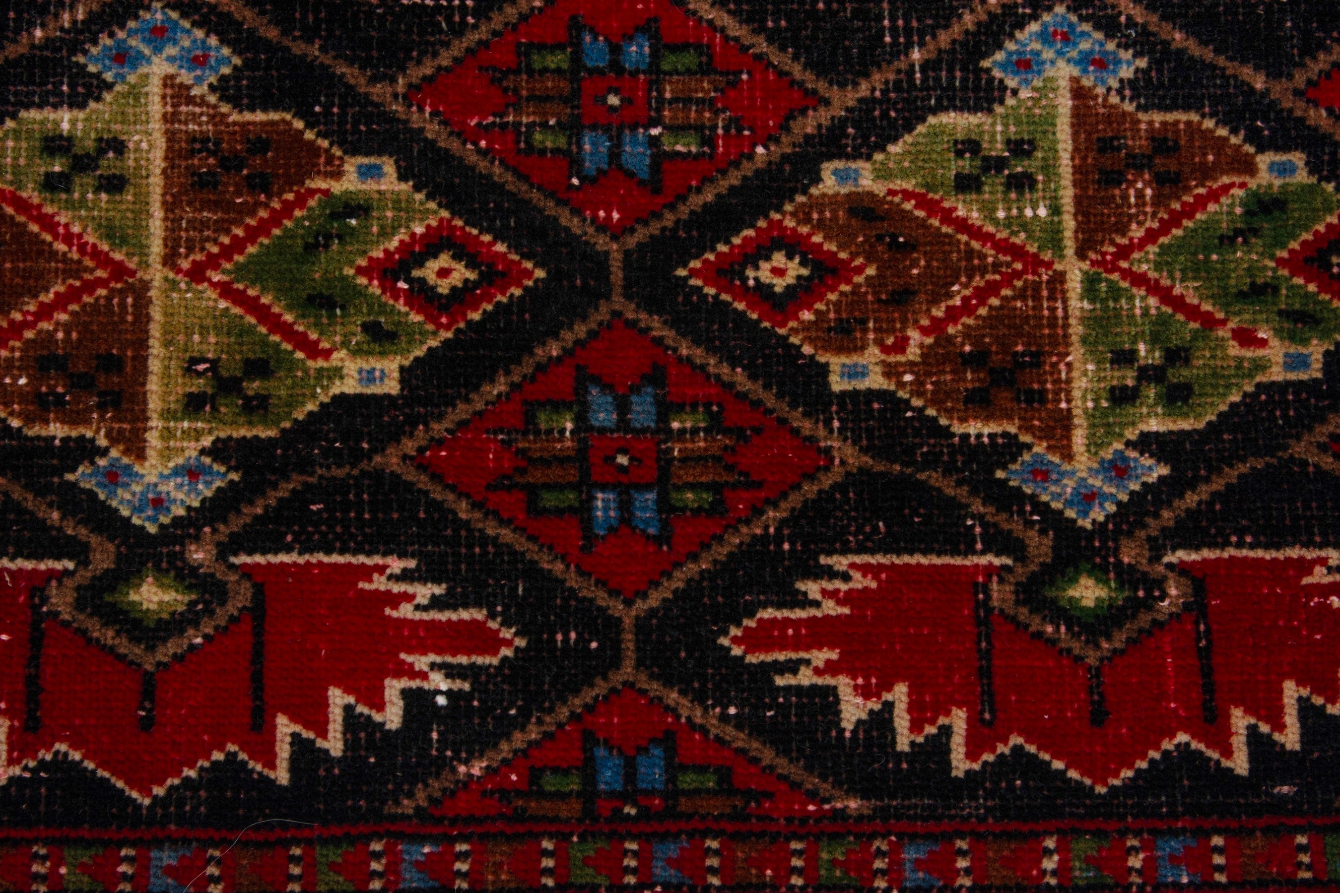 Persian Torkaman accent rug in deep red and burgundy, view 11 of 17
