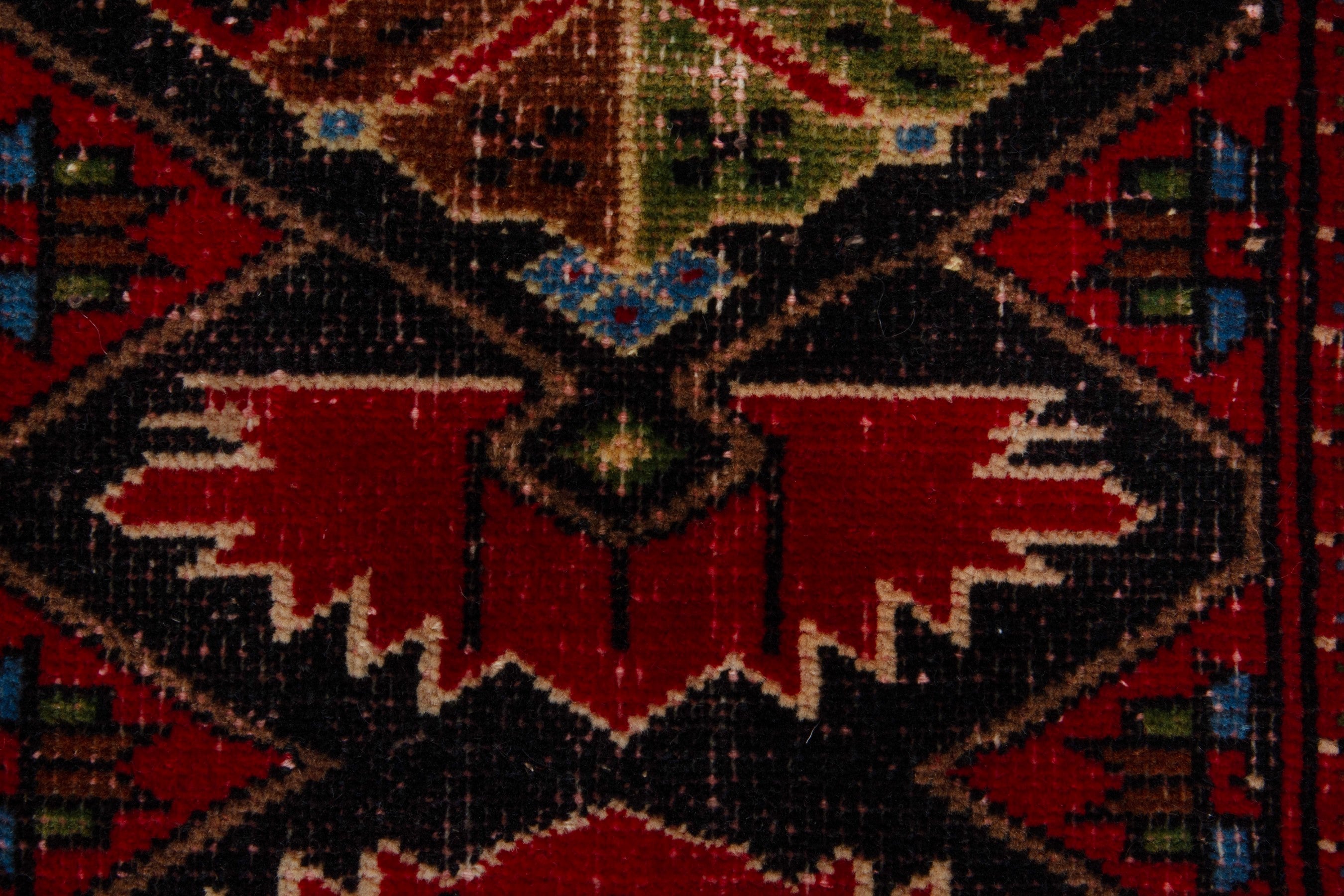Persian Torkaman accent rug in deep red and burgundy, view 12 of 17