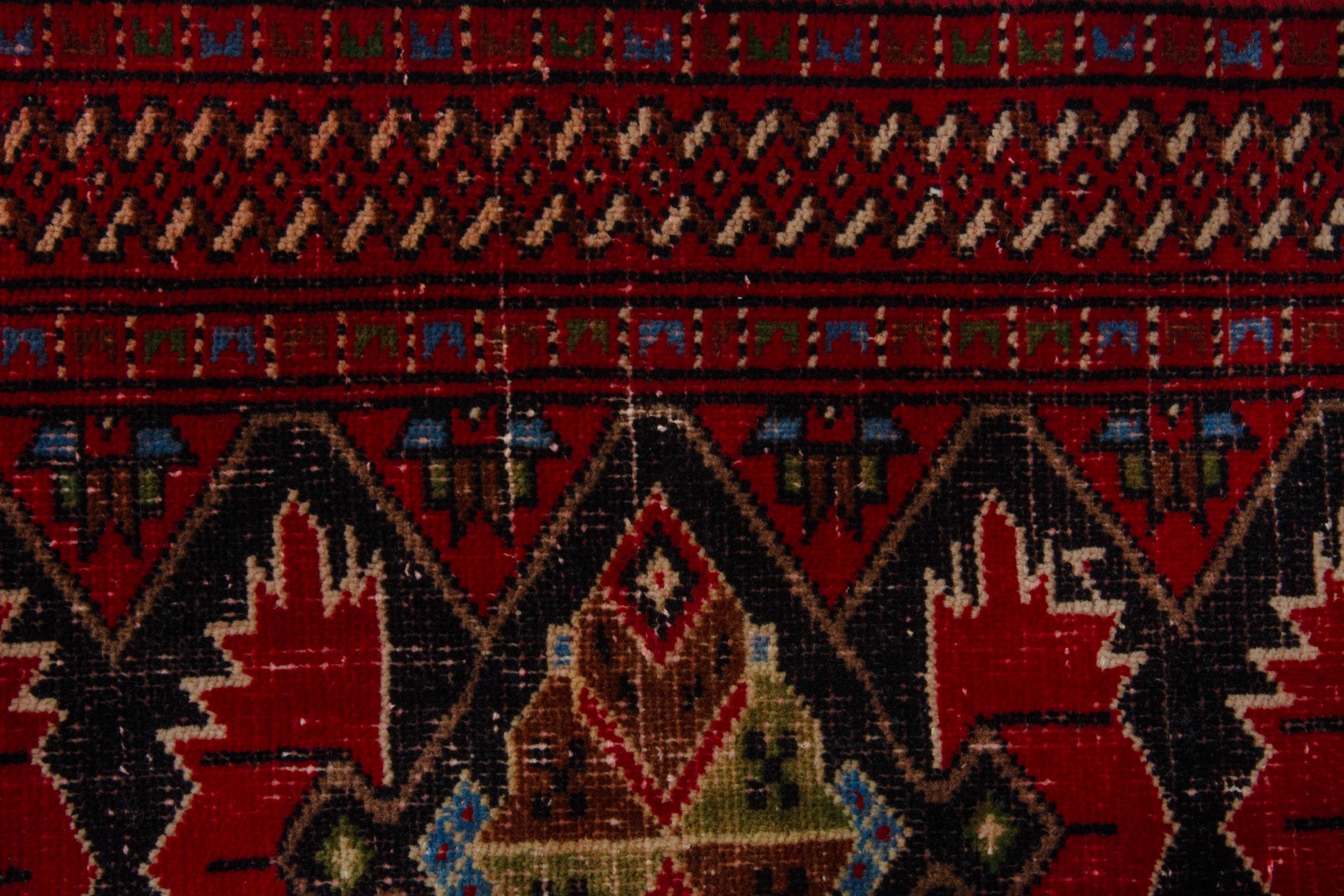 Persian Torkaman accent rug in deep red and burgundy, view 13 of 17