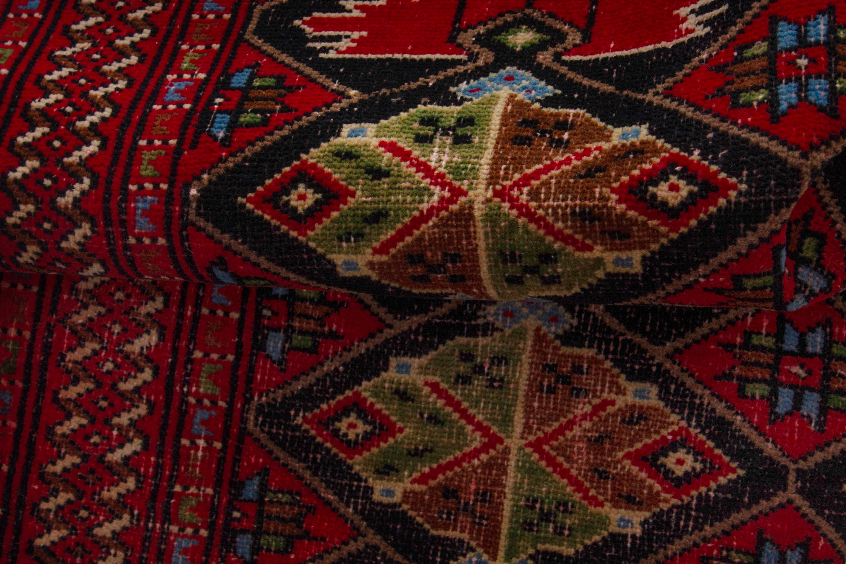 Persian Torkaman accent rug in deep red and burgundy, view 14 of 17