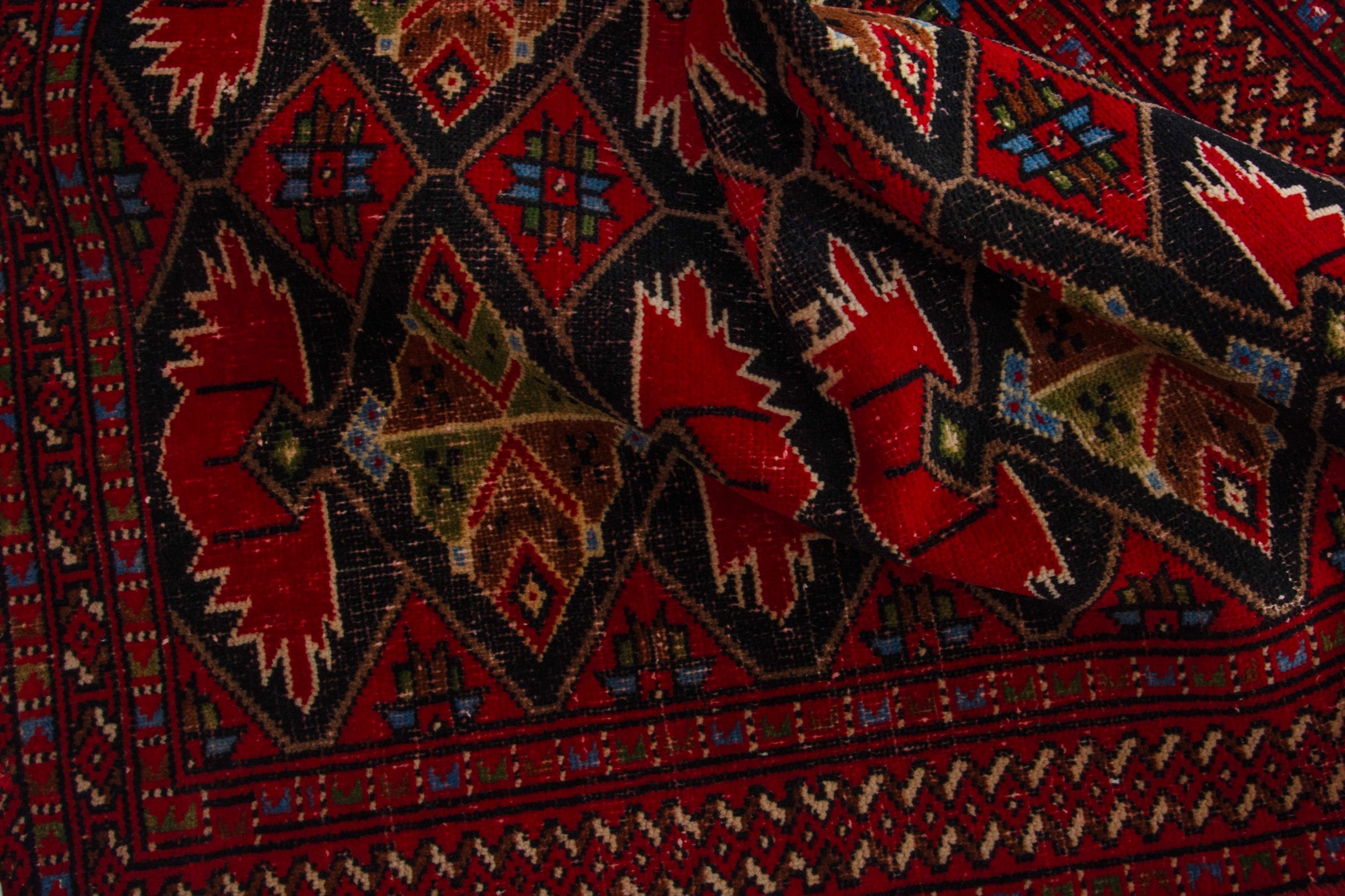 Persian Torkaman accent rug in deep red and burgundy, view 16 of 17