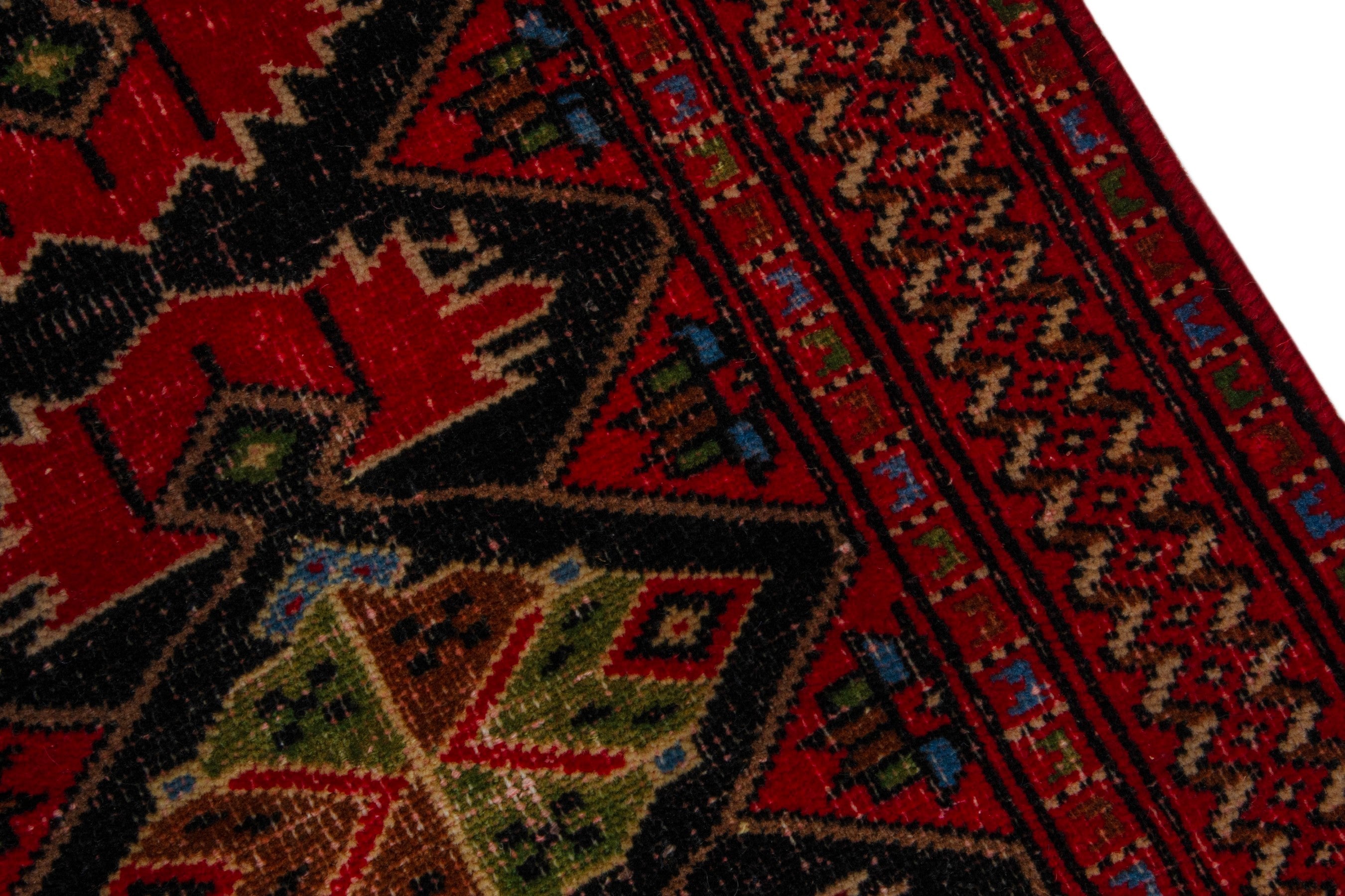 Persian Torkaman accent rug in deep red and burgundy, view 7 of 17