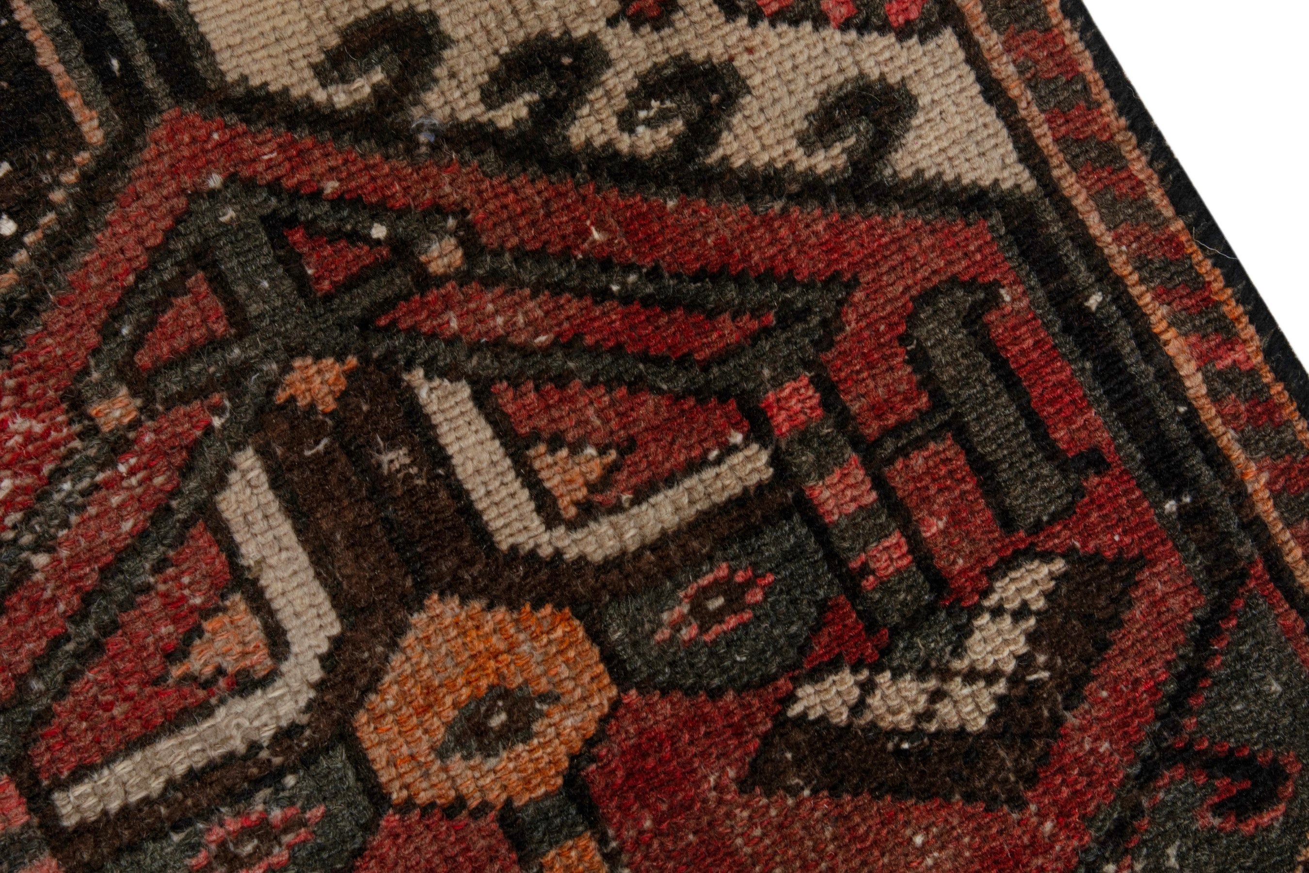 Persian Bakhtiari accent rug in deep red and dark brown, view 7 of 18