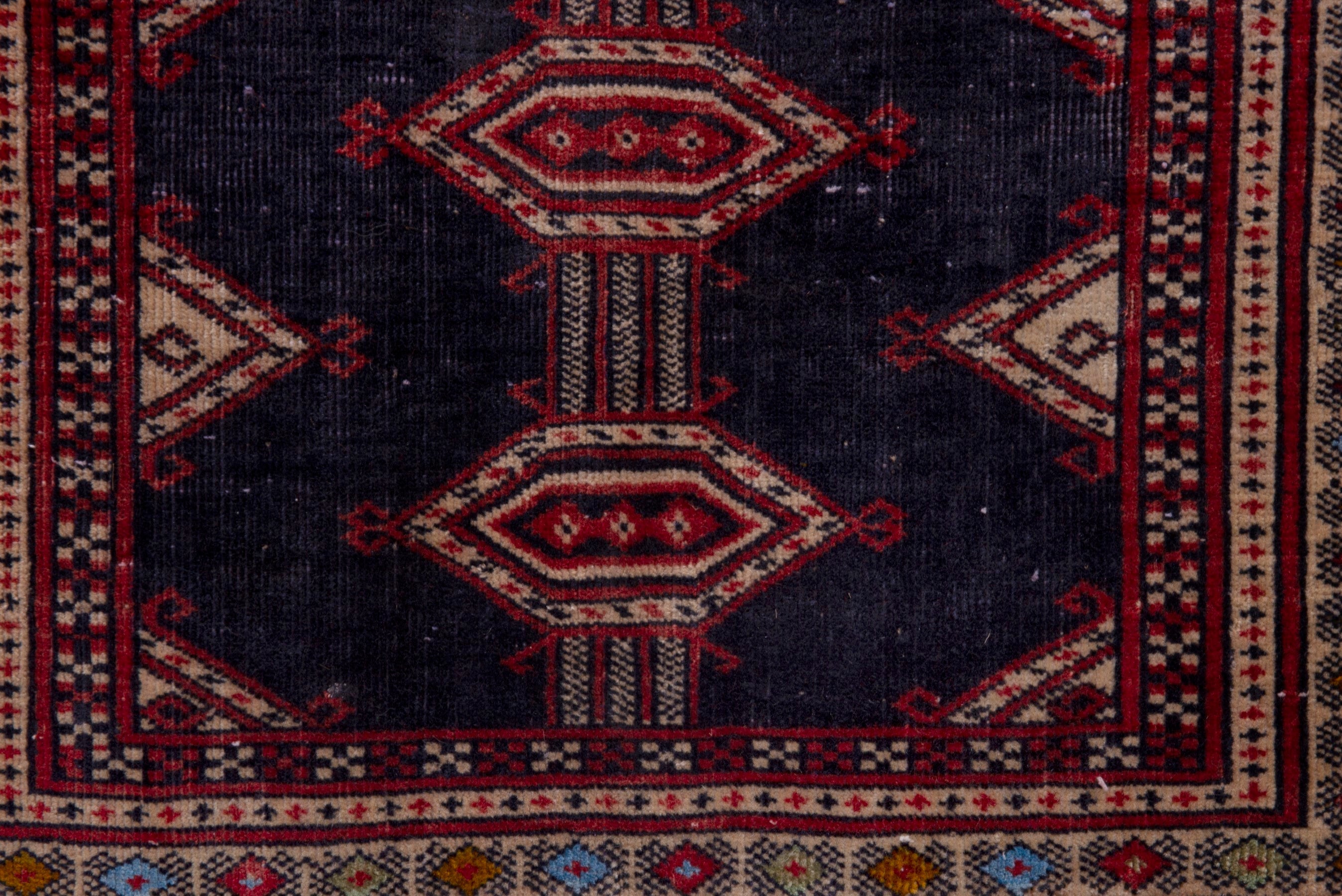 Persian Torkaman accent rug in navy and deep red, view 11 of 17