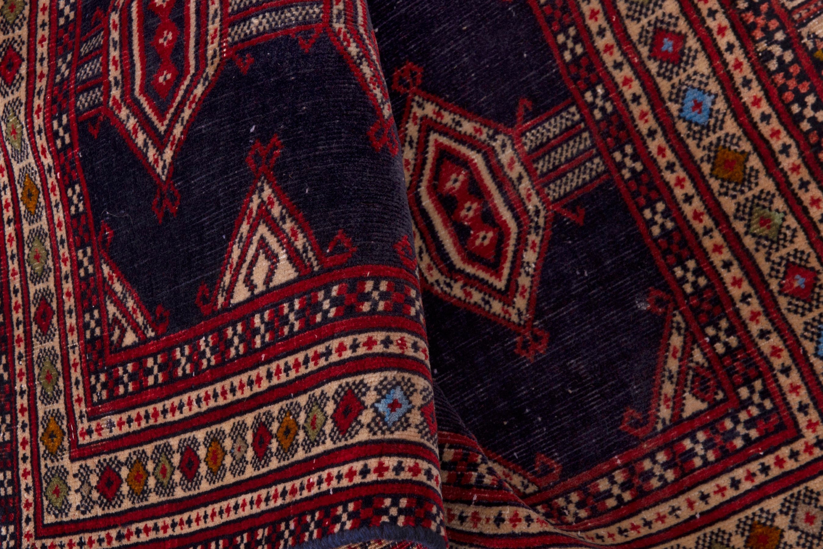 Persian Torkaman accent rug in navy and deep red, view 14 of 17