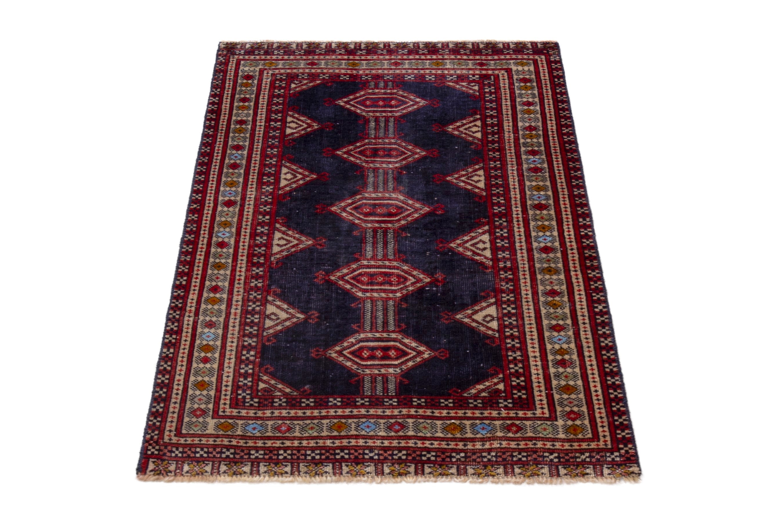 Persian Torkaman accent rug in navy and deep red, view 2 of 17