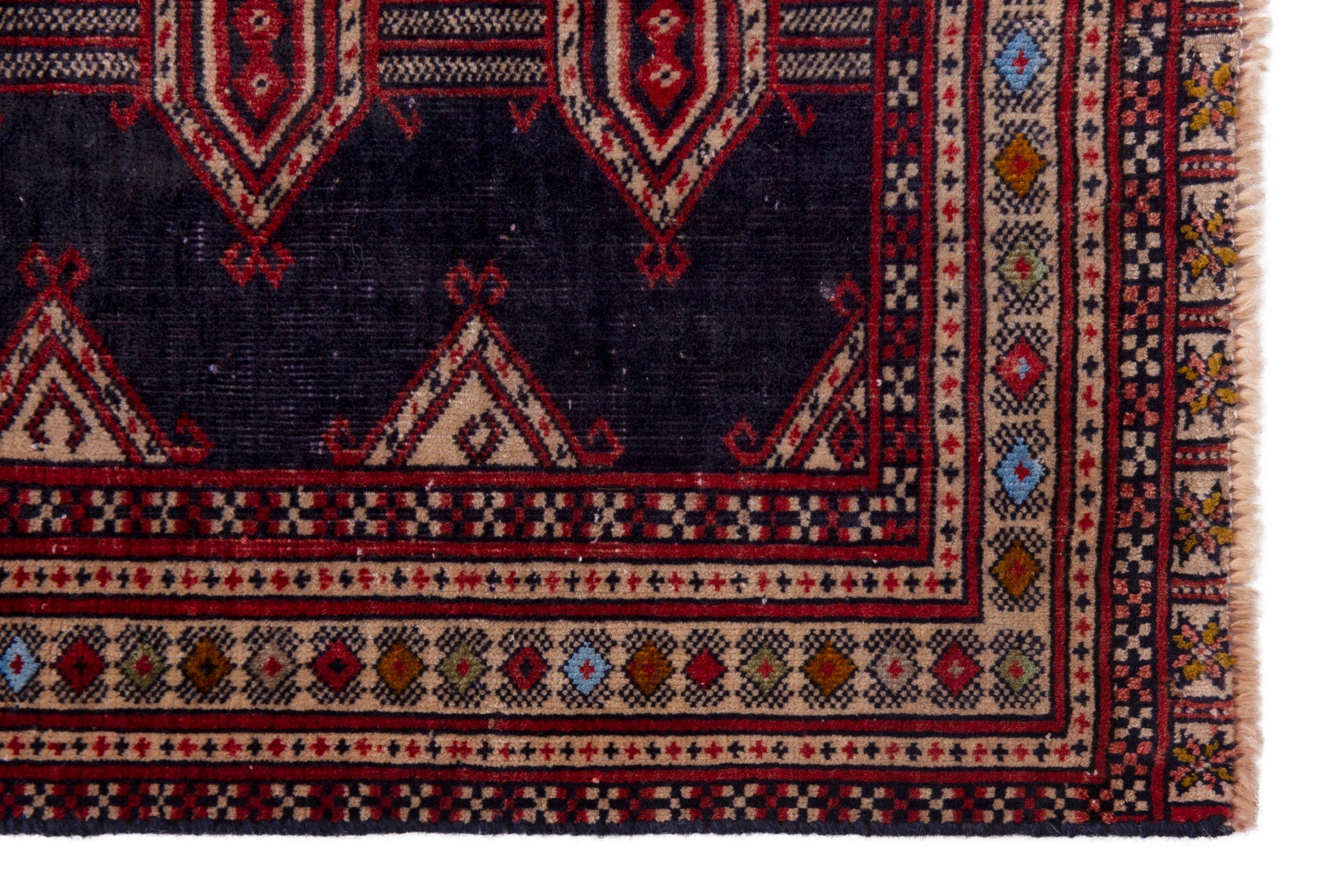 Persian Torkaman accent rug in navy and deep red, view 5 of 17