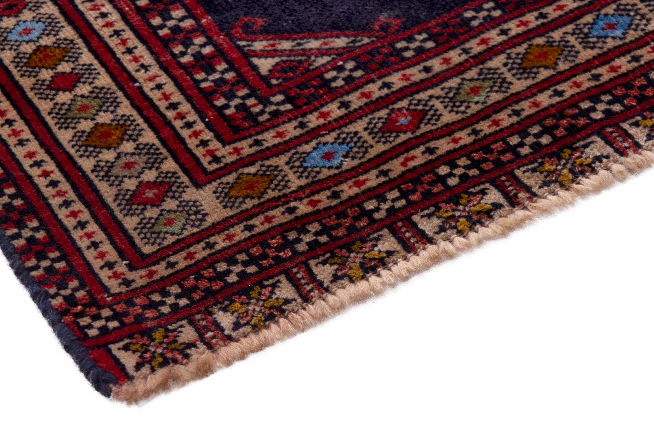 Persian Torkaman accent rug in navy and deep red, view 6 of 17