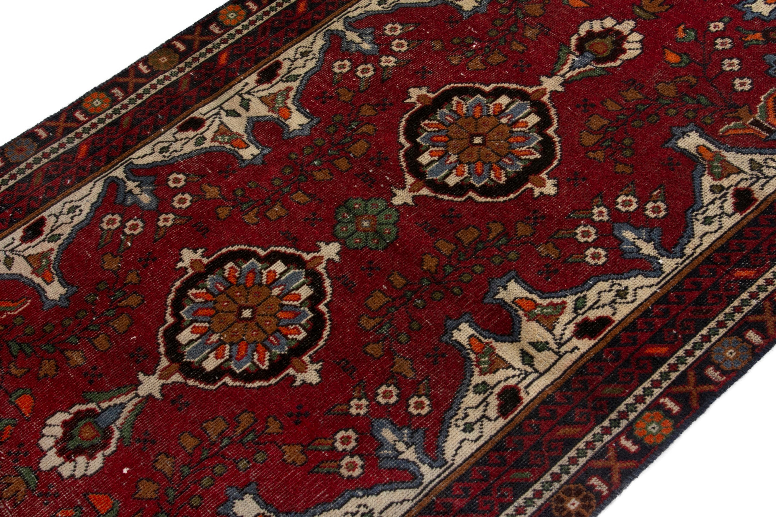 Persian Baluch accent rug in deep red and cream, view 4 of 18