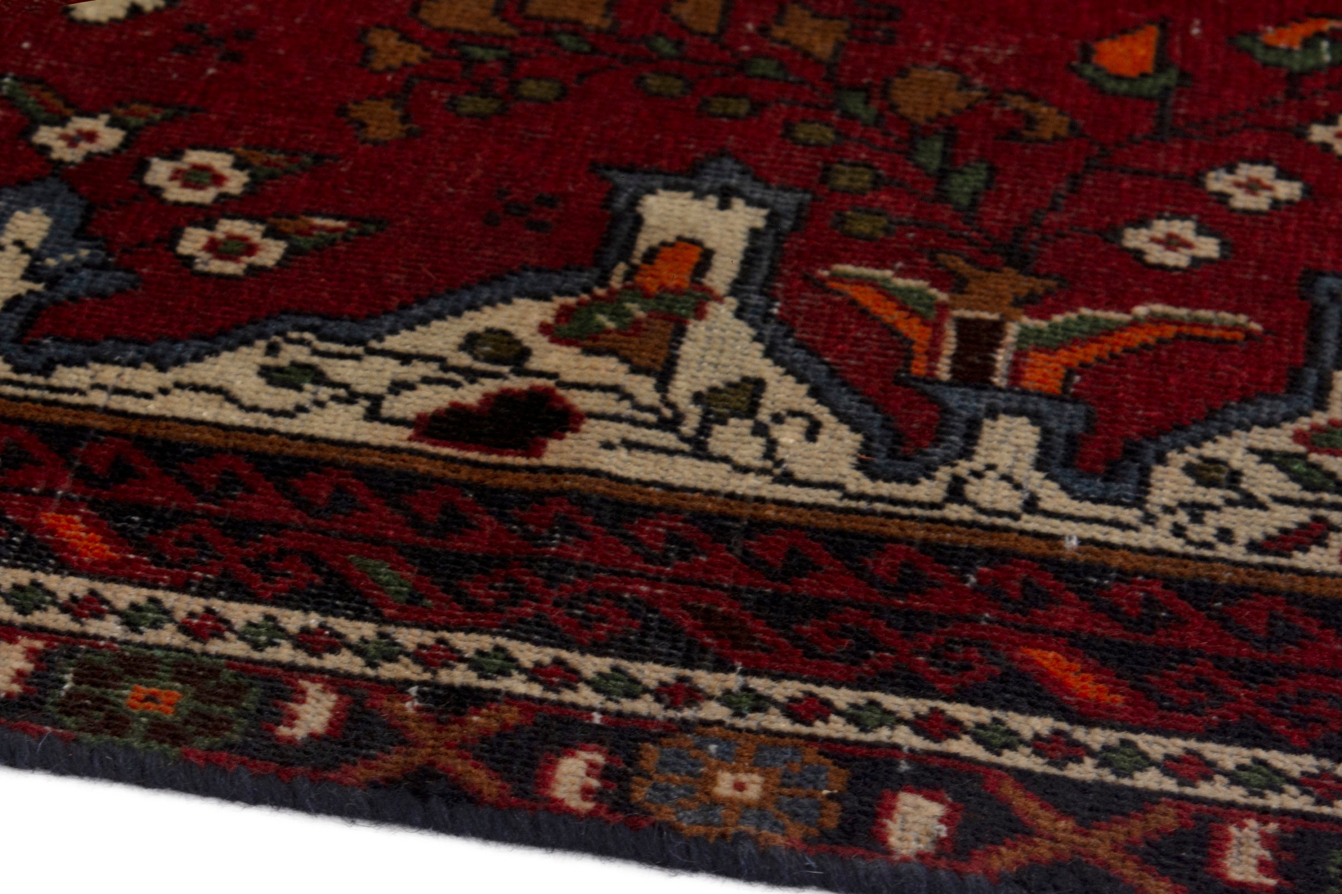 Persian Baluch accent rug in deep red and cream, view 8 of 18