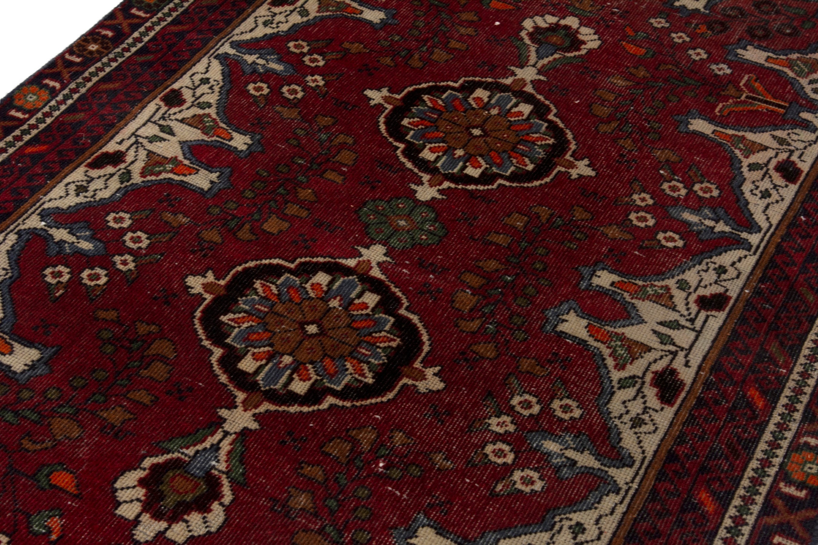 Persian Baluch accent rug in deep red and cream, view 9 of 18