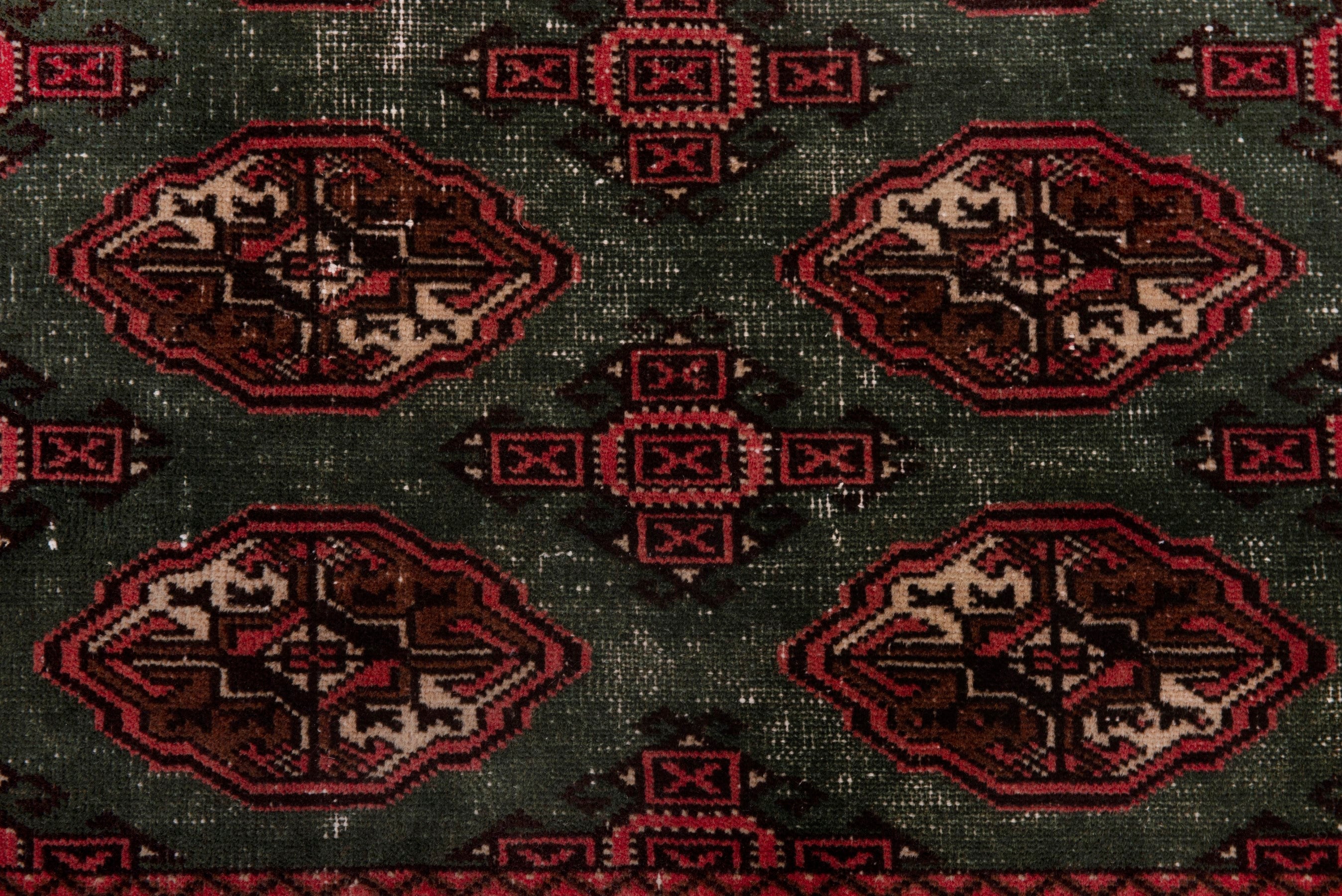 Persian Torkaman accent rug in forest and burgundy, view 11 of 18