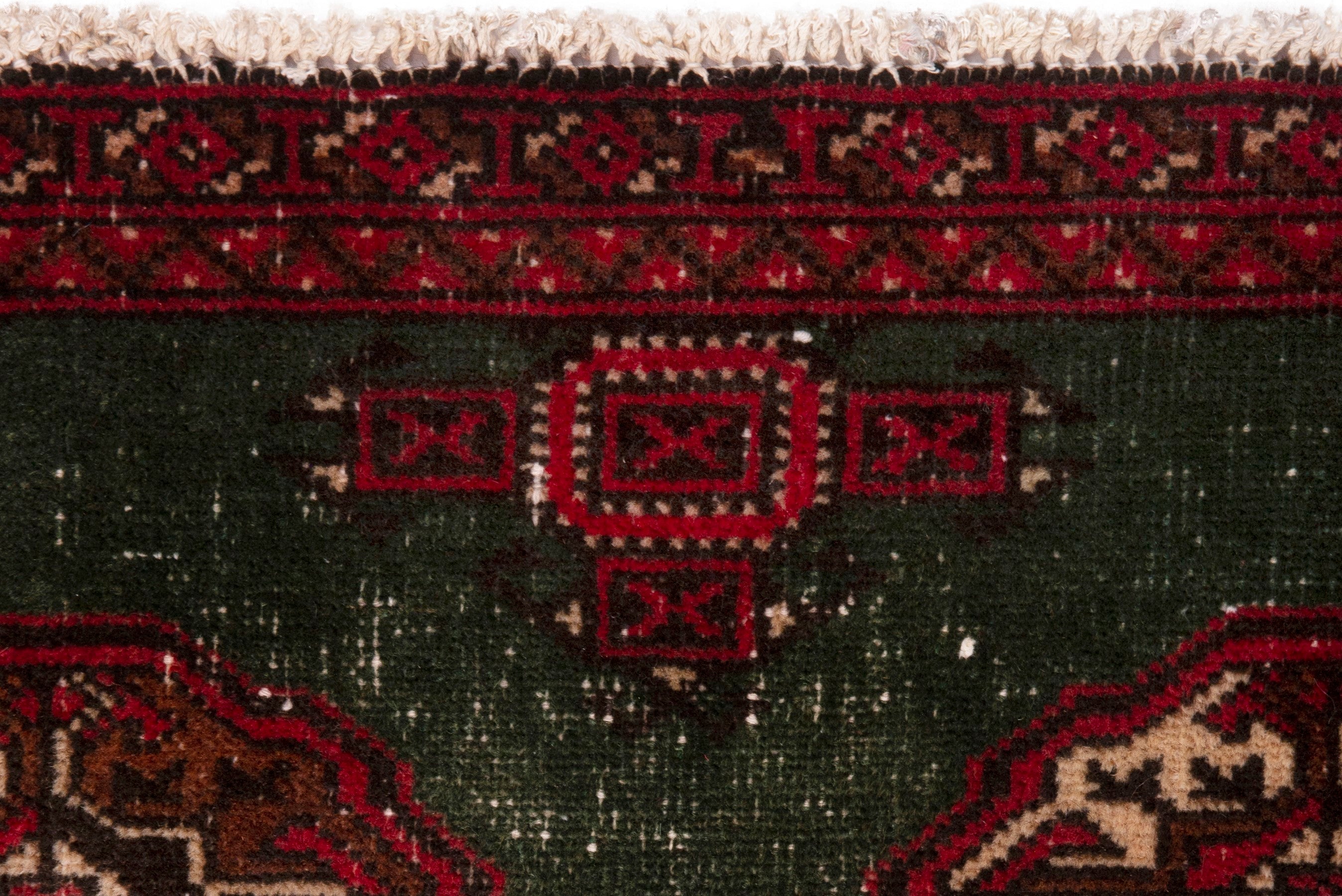 Persian Torkaman accent rug in forest and burgundy, view 14 of 18