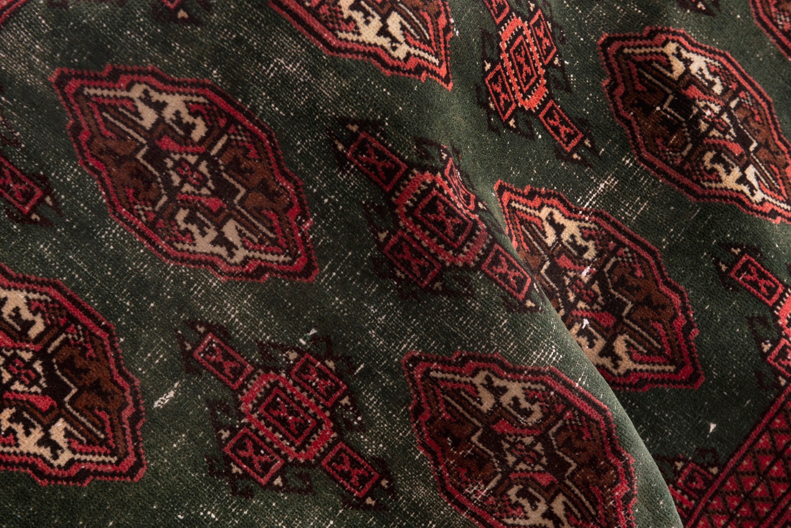 Persian Torkaman accent rug in forest and burgundy, view 17 of 18