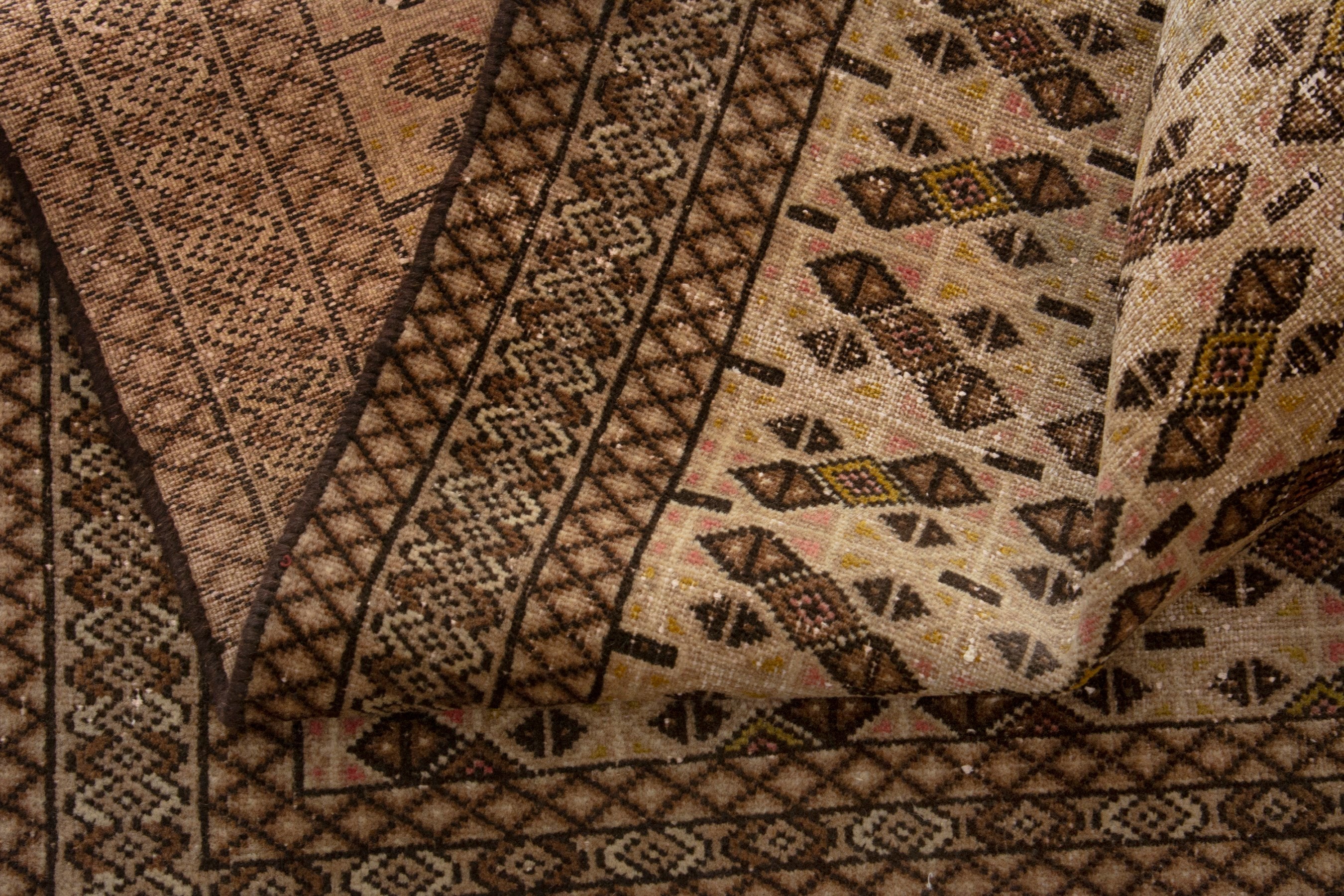Persian Torkaman accent rug in cream and dark brown, view 14 of 17