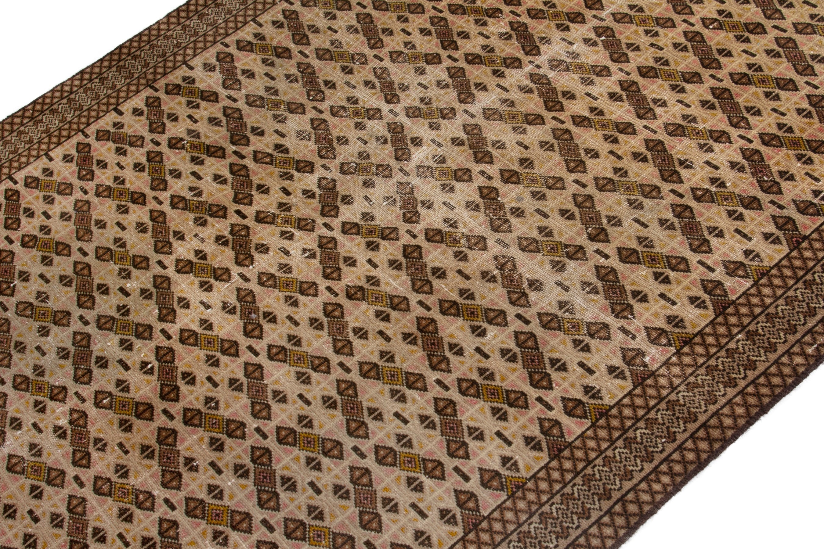 Persian Torkaman accent rug in cream and dark brown, view 4 of 17