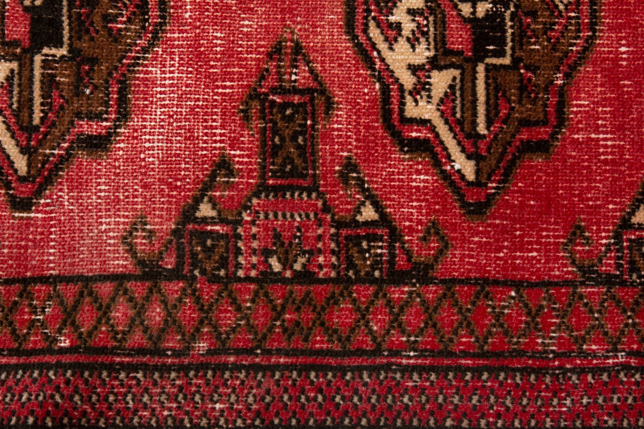 Persian Torkaman accent rug in deep red and dark brown, view 13 of 17
