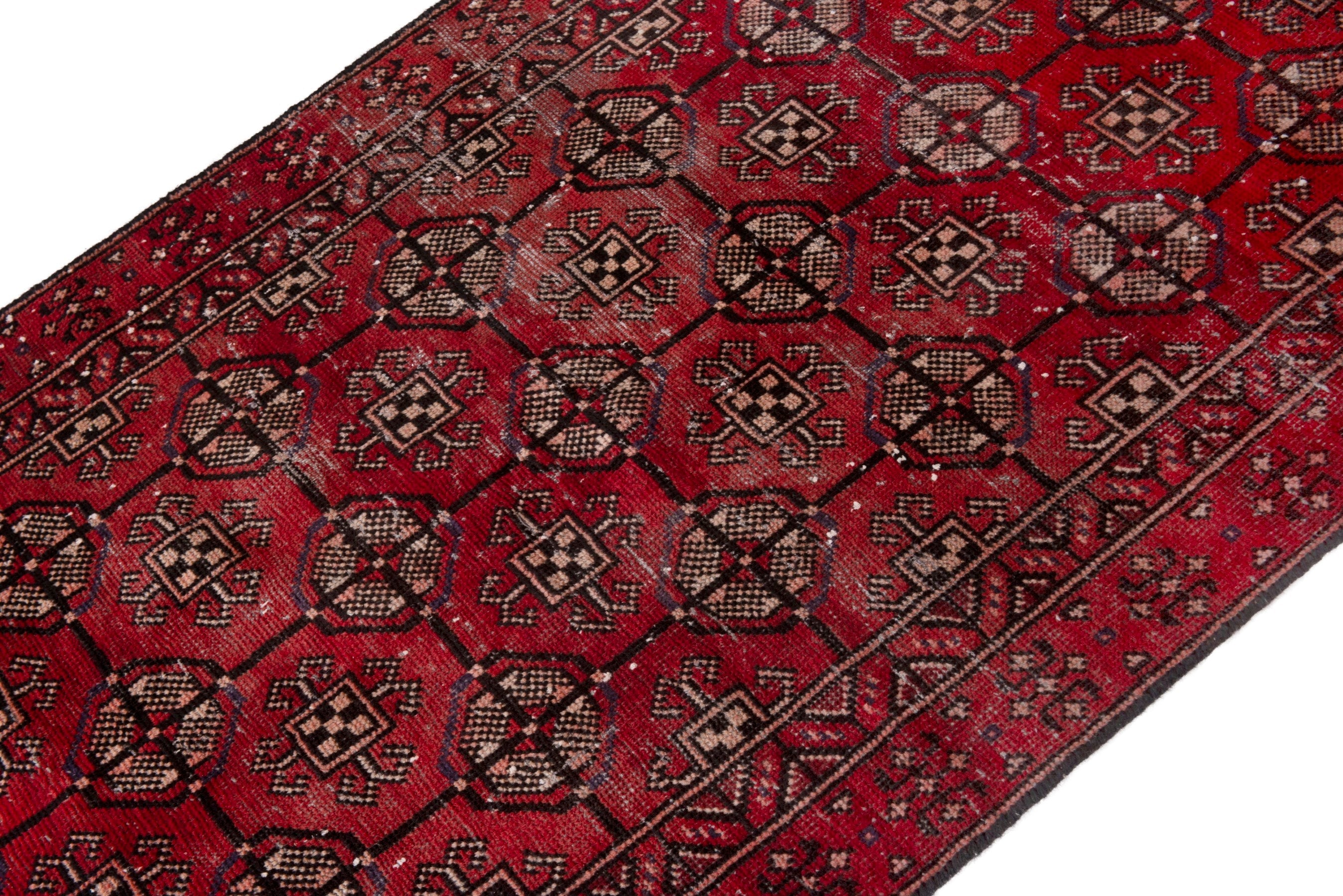Persian Ferdos accent rug in deep red and chestnut, view 4 of 18