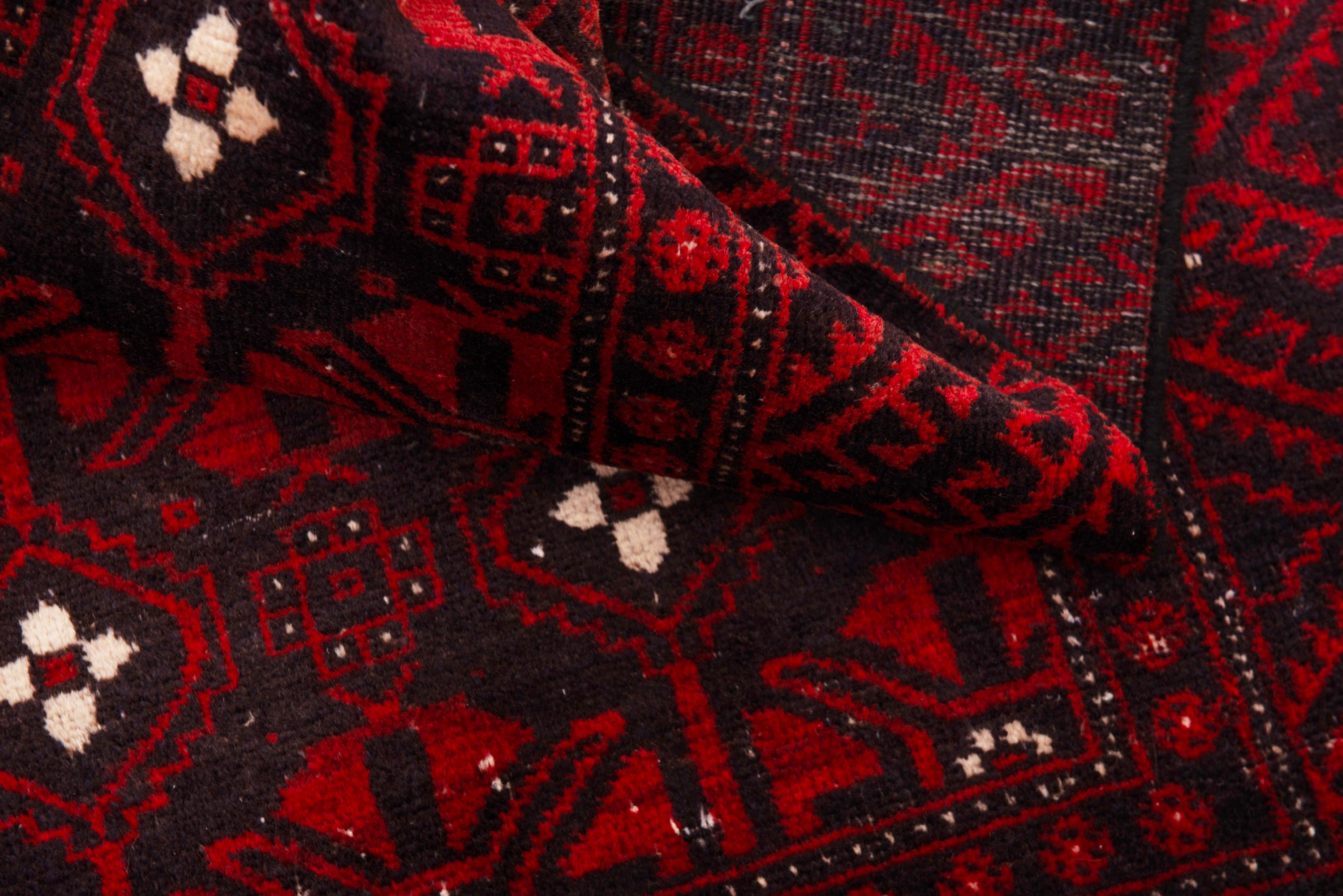Persian Baluch runner rug in deep red and burgundy, view 15 of 18