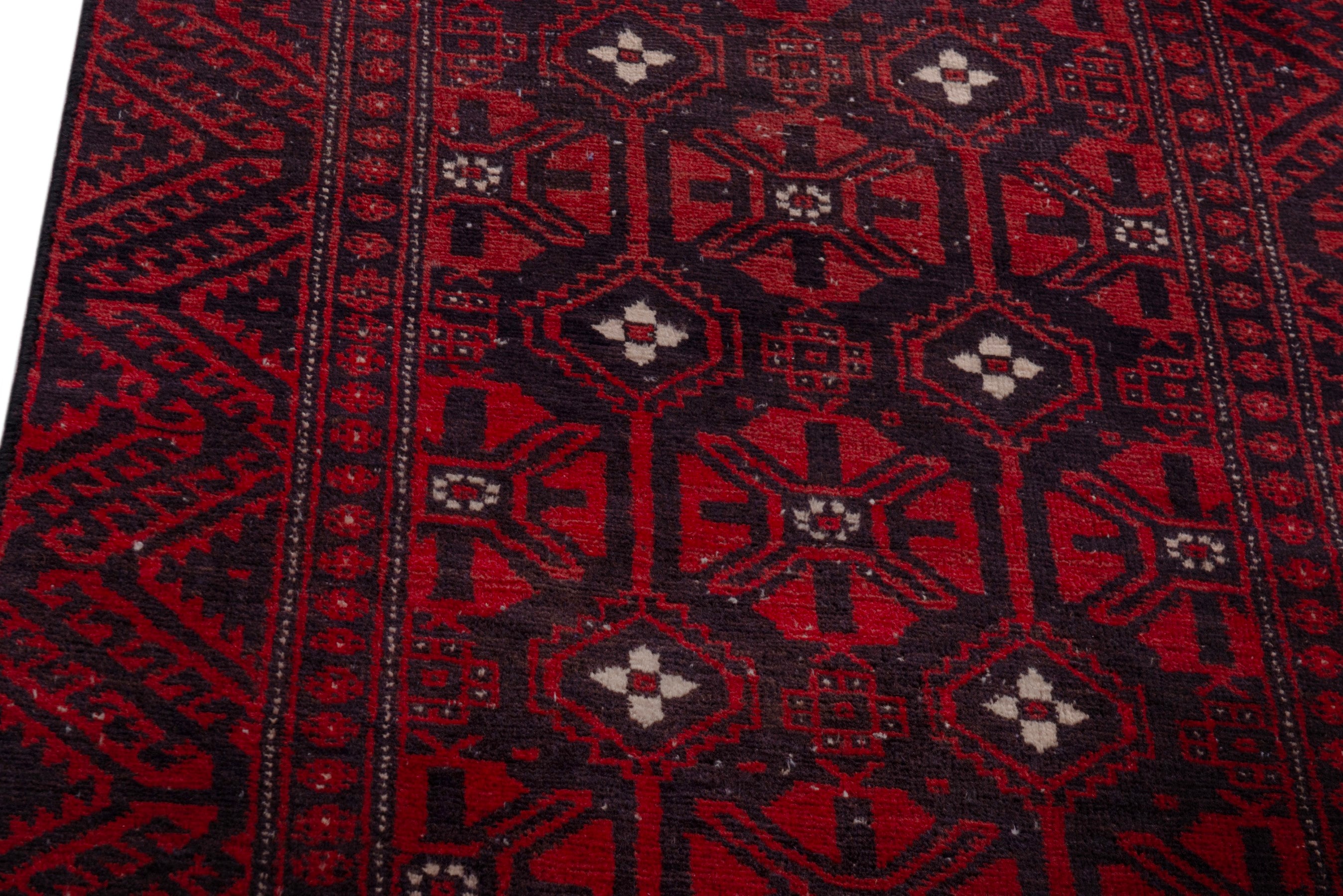 Persian Baluch runner rug in deep red and burgundy, view 7 of 18