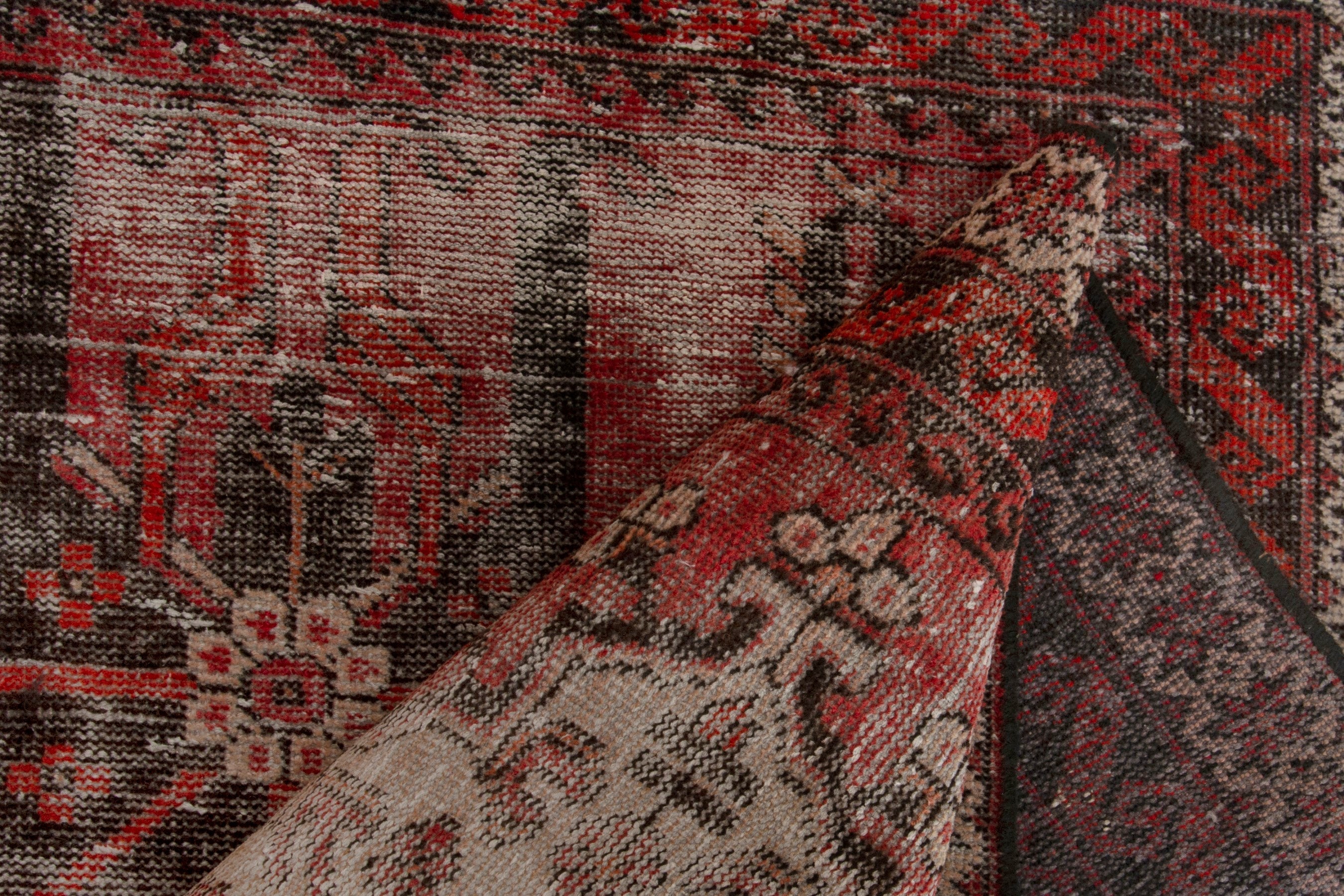 Persian Ferdos accent rug in faded red and deep red, view 16 of 18