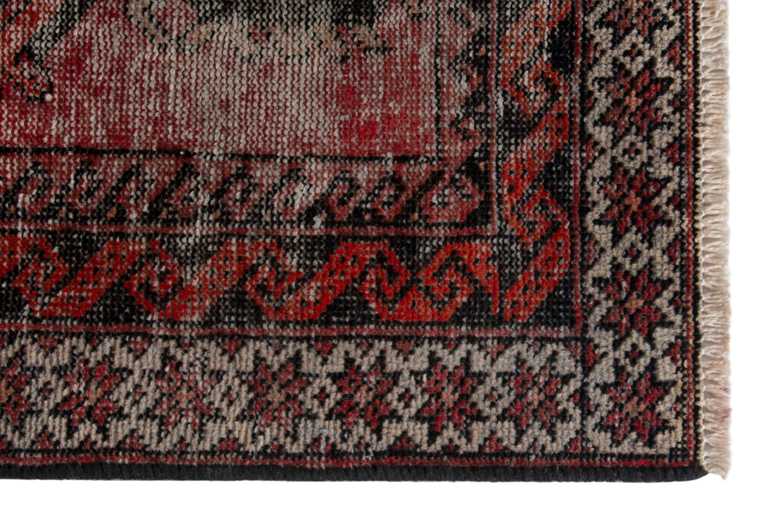 Persian Ferdos accent rug in faded red and deep red, view 5 of 18