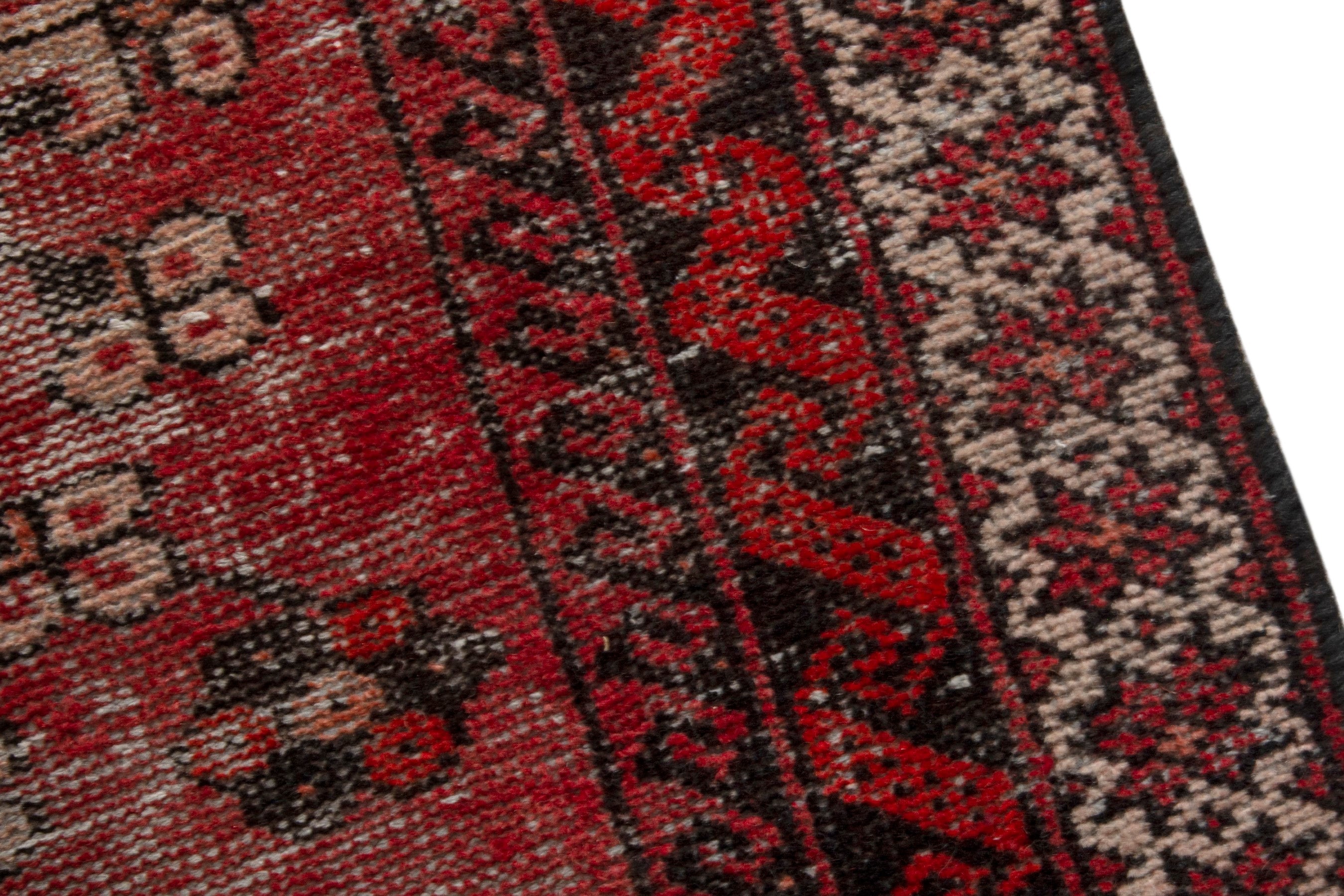 Persian Ferdos accent rug in faded red and deep red, view 7 of 18