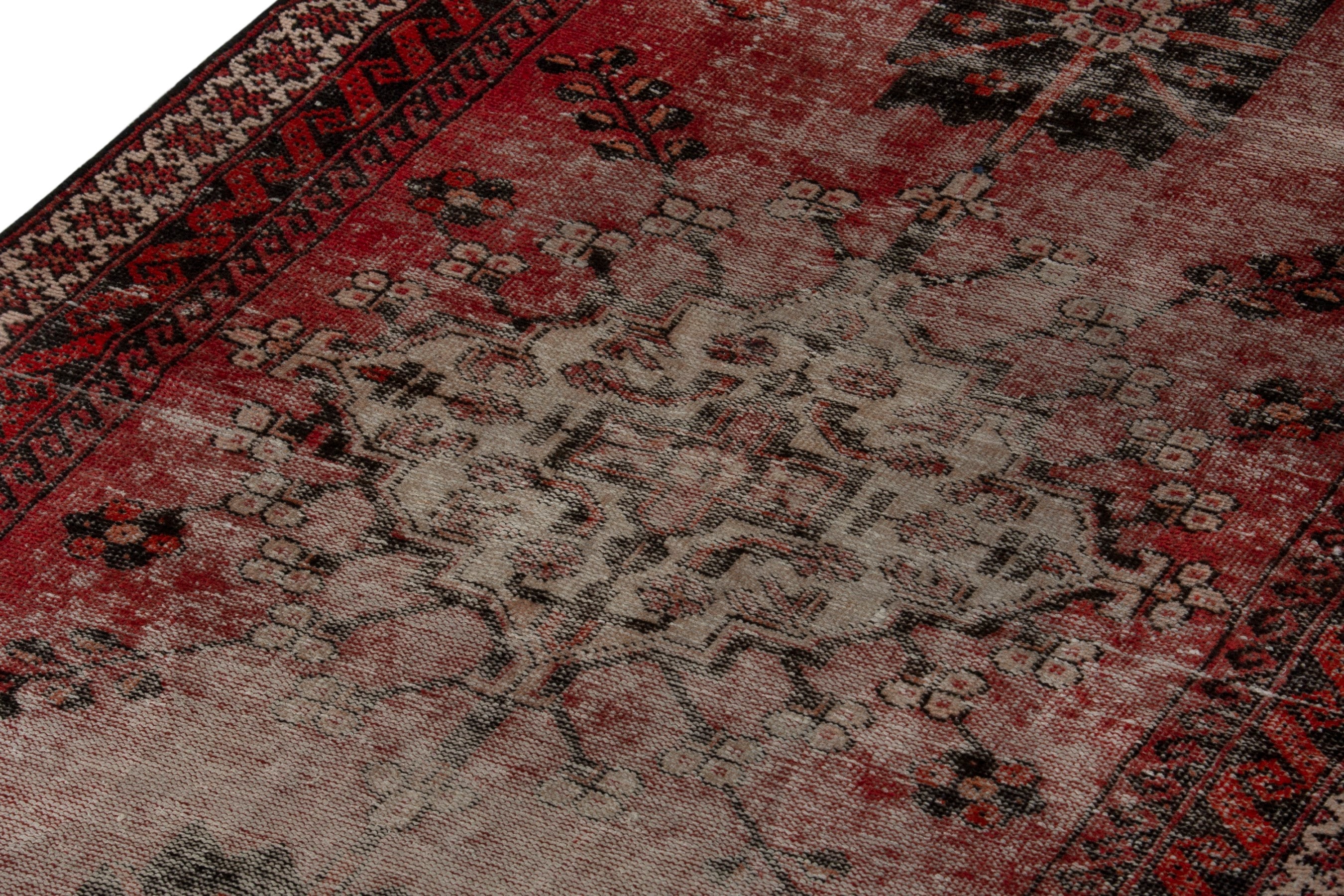 Persian Ferdos accent rug in faded red and deep red, view 9 of 18