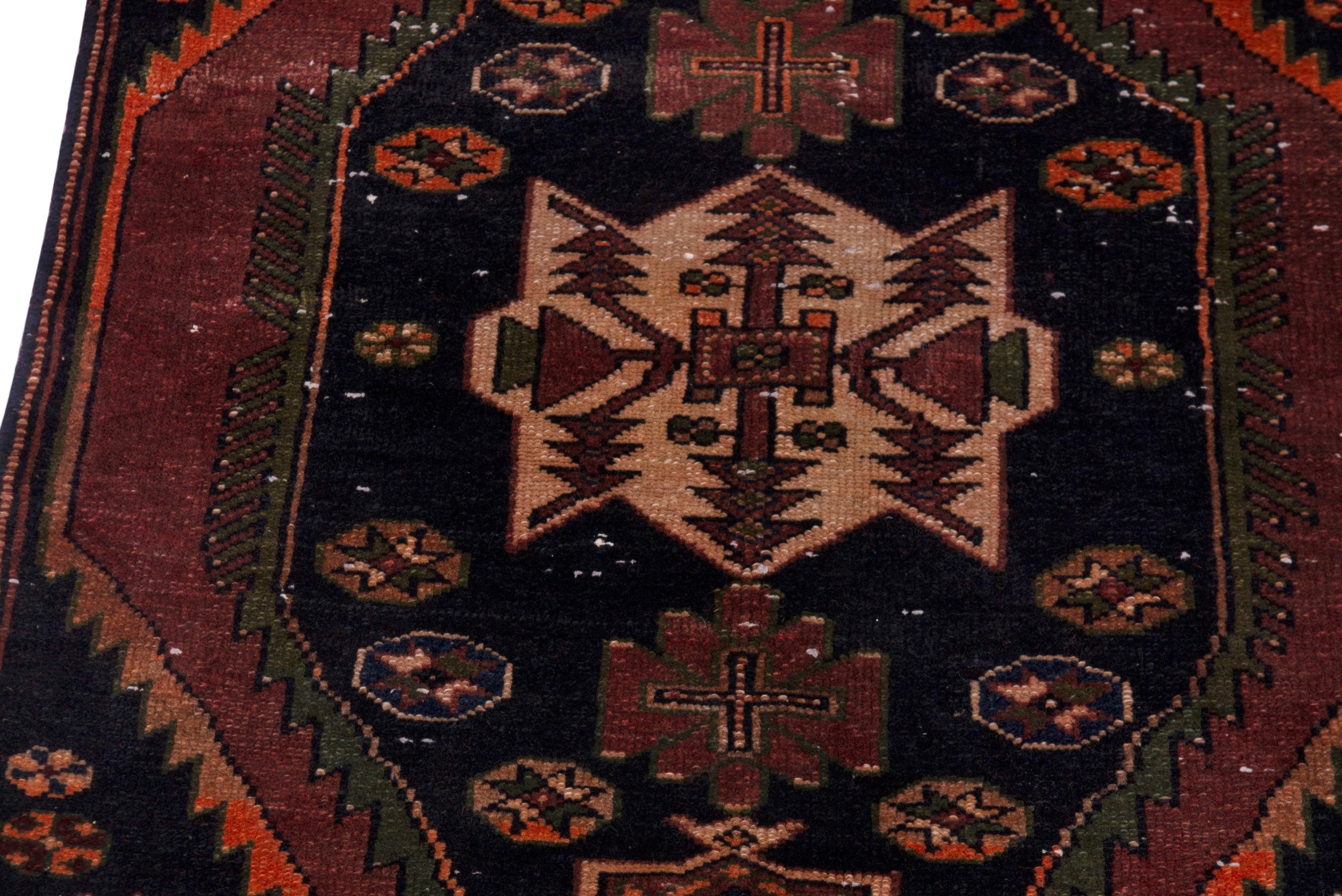 Persian Saveh accent rug in navy and rust, view 9 of 19