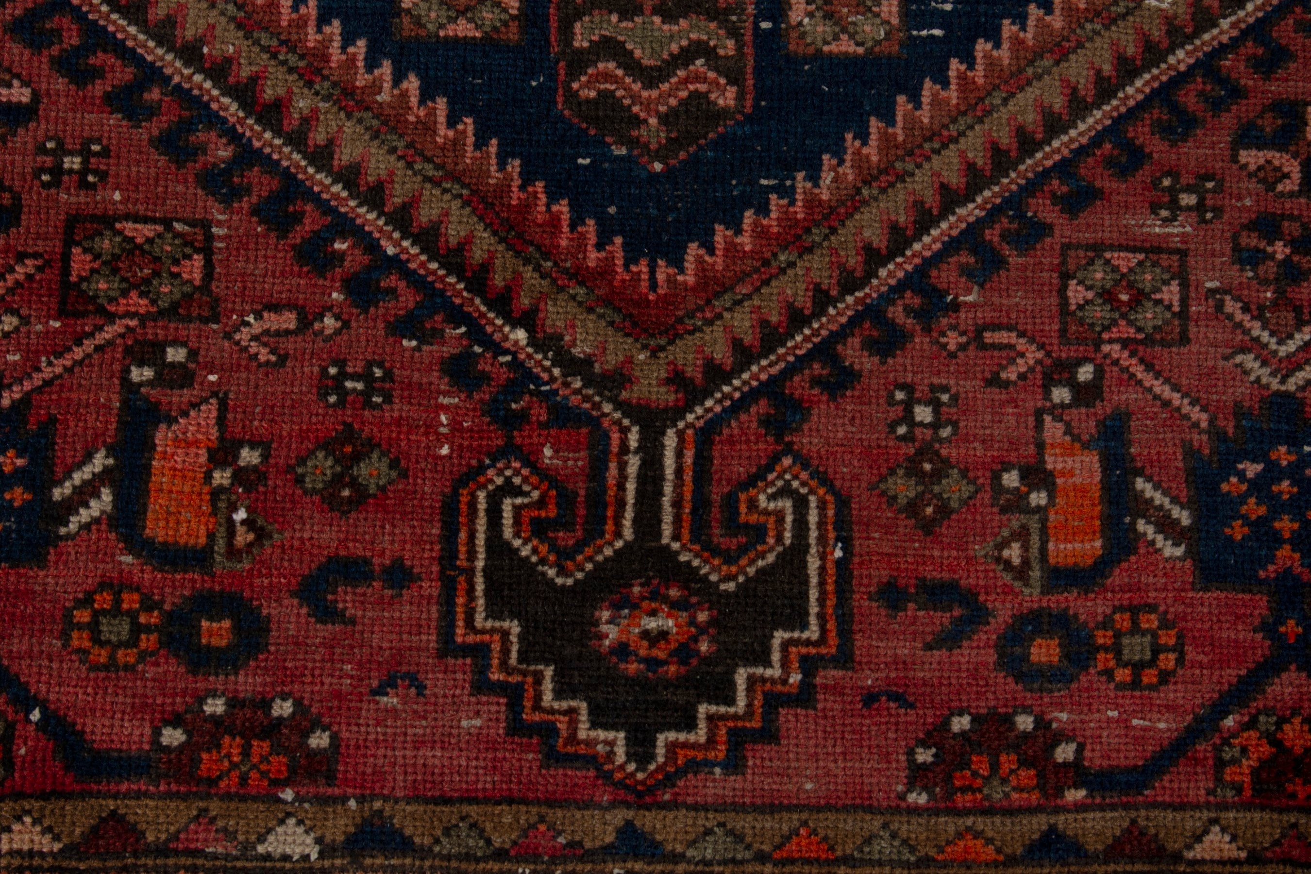 Persian Zanjan accent rug in rust and navy, view 11 of 18