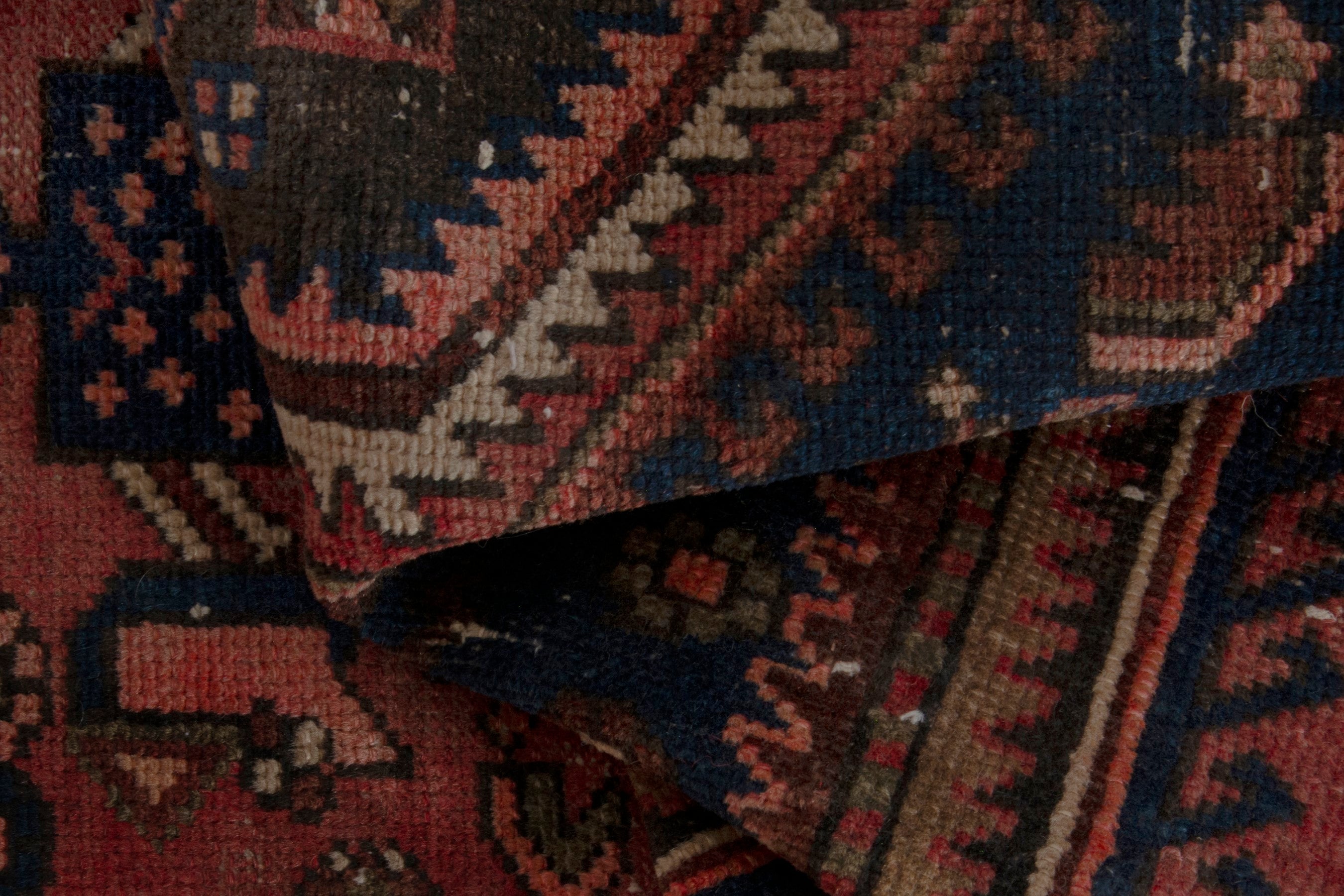 Persian Zanjan accent rug in rust and navy, view 15 of 18