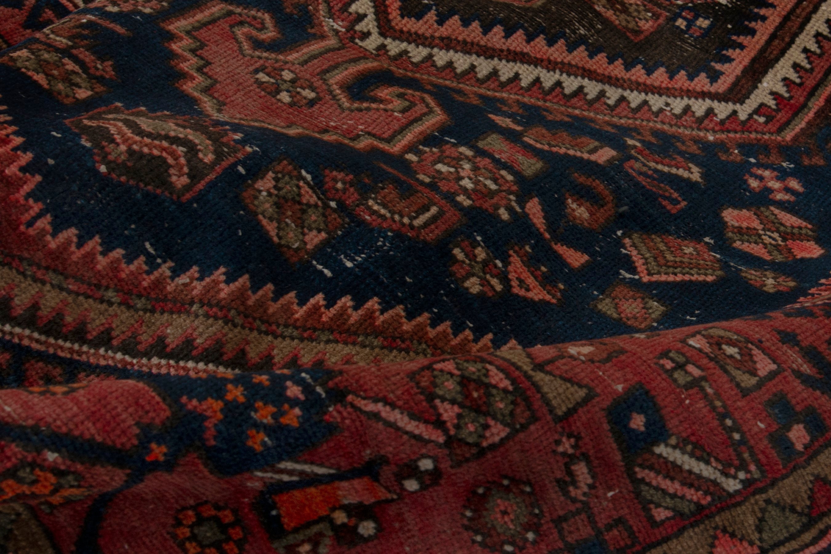 Persian Zanjan accent rug in rust and navy, view 16 of 18
