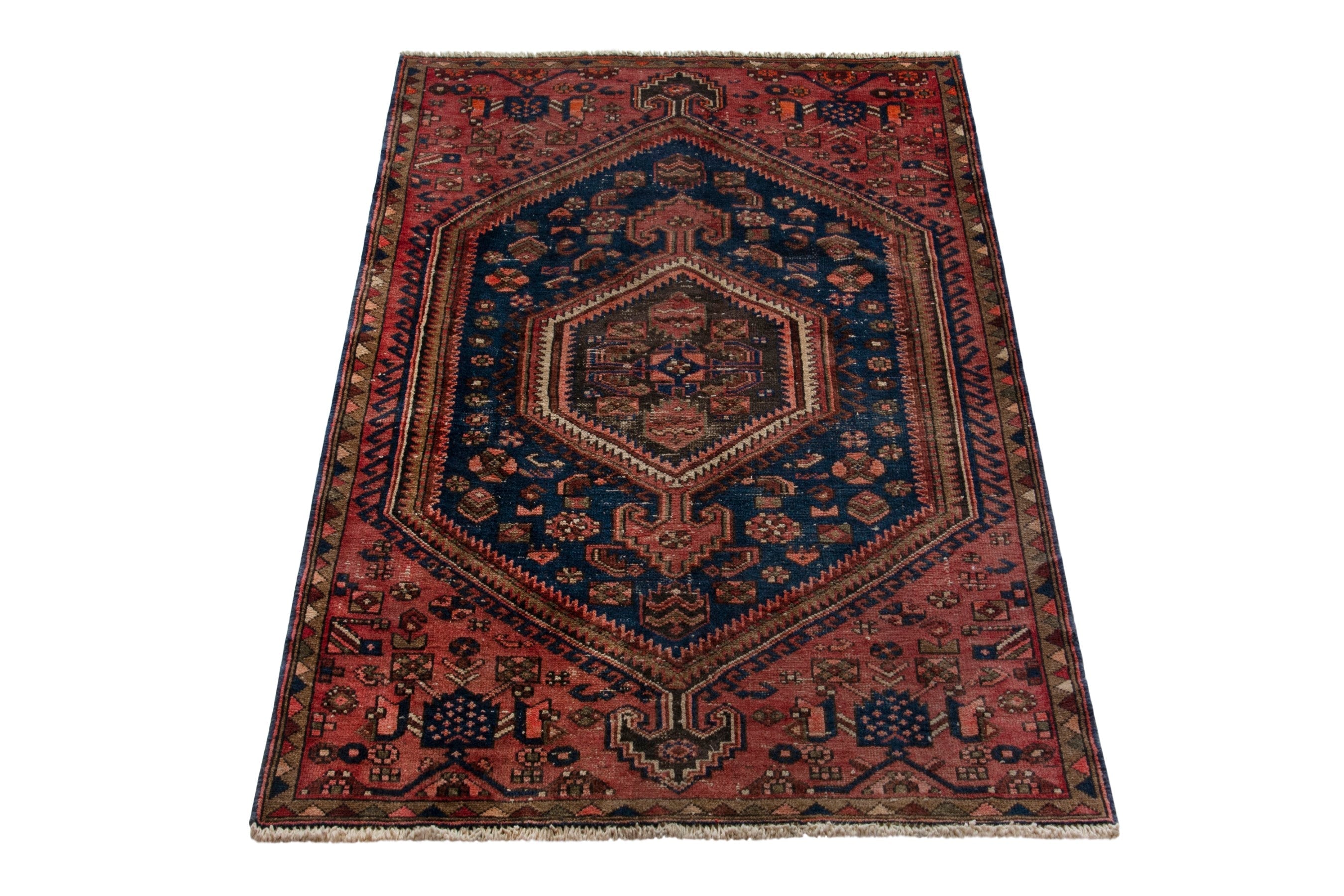 Persian Zanjan accent rug in rust and navy, view 3 of 18