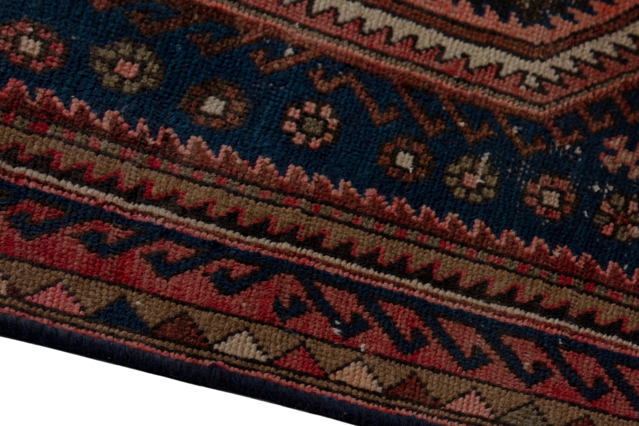 Persian Zanjan accent rug in rust and navy, view 8 of 18