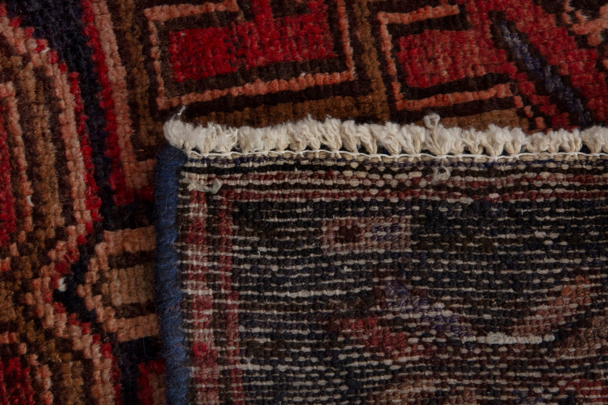 Persian Zanjan runner rug in deep red and navy, view 18 of 18