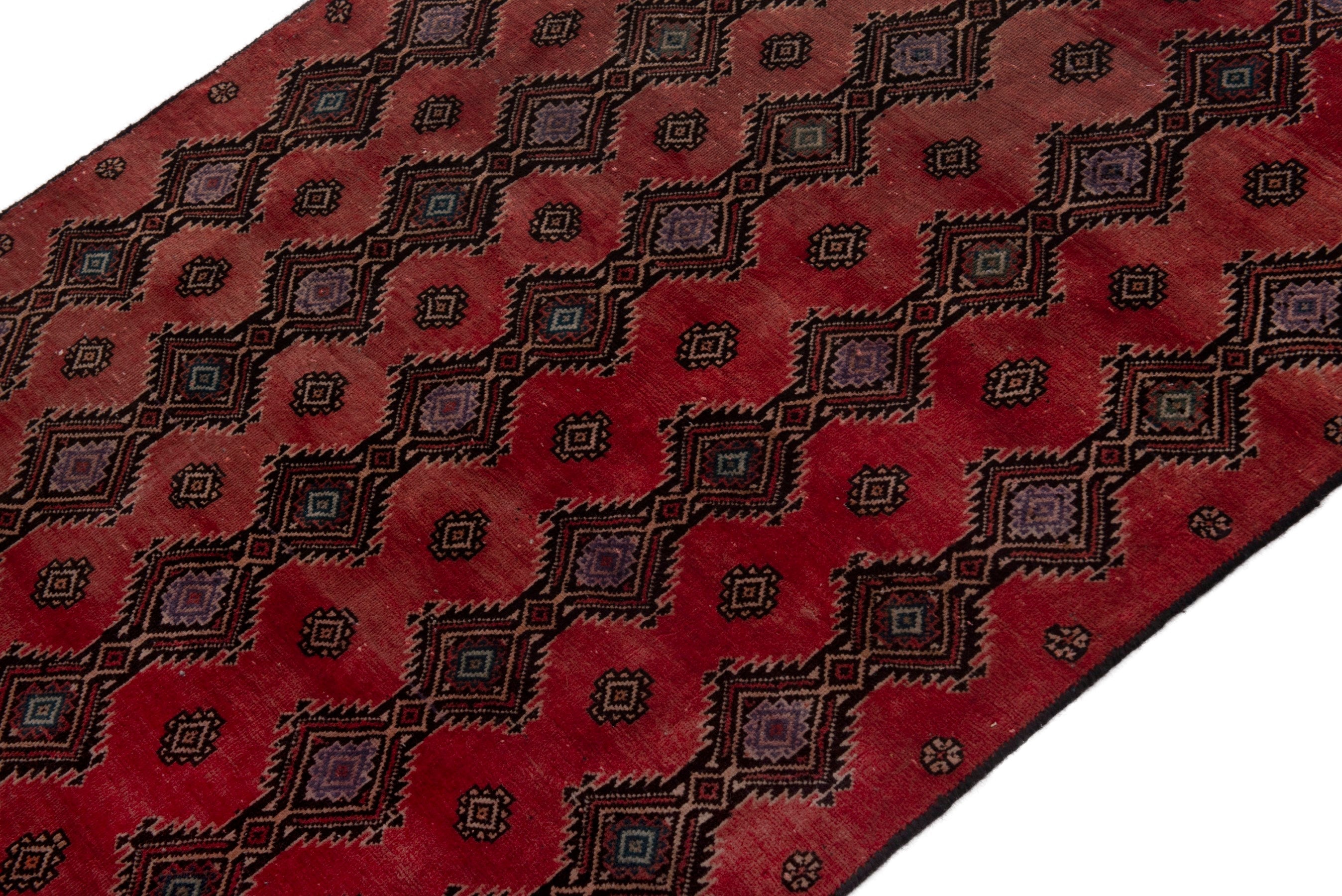 Persian Baluch accent rug in deep red and dark brown, view 4 of 17