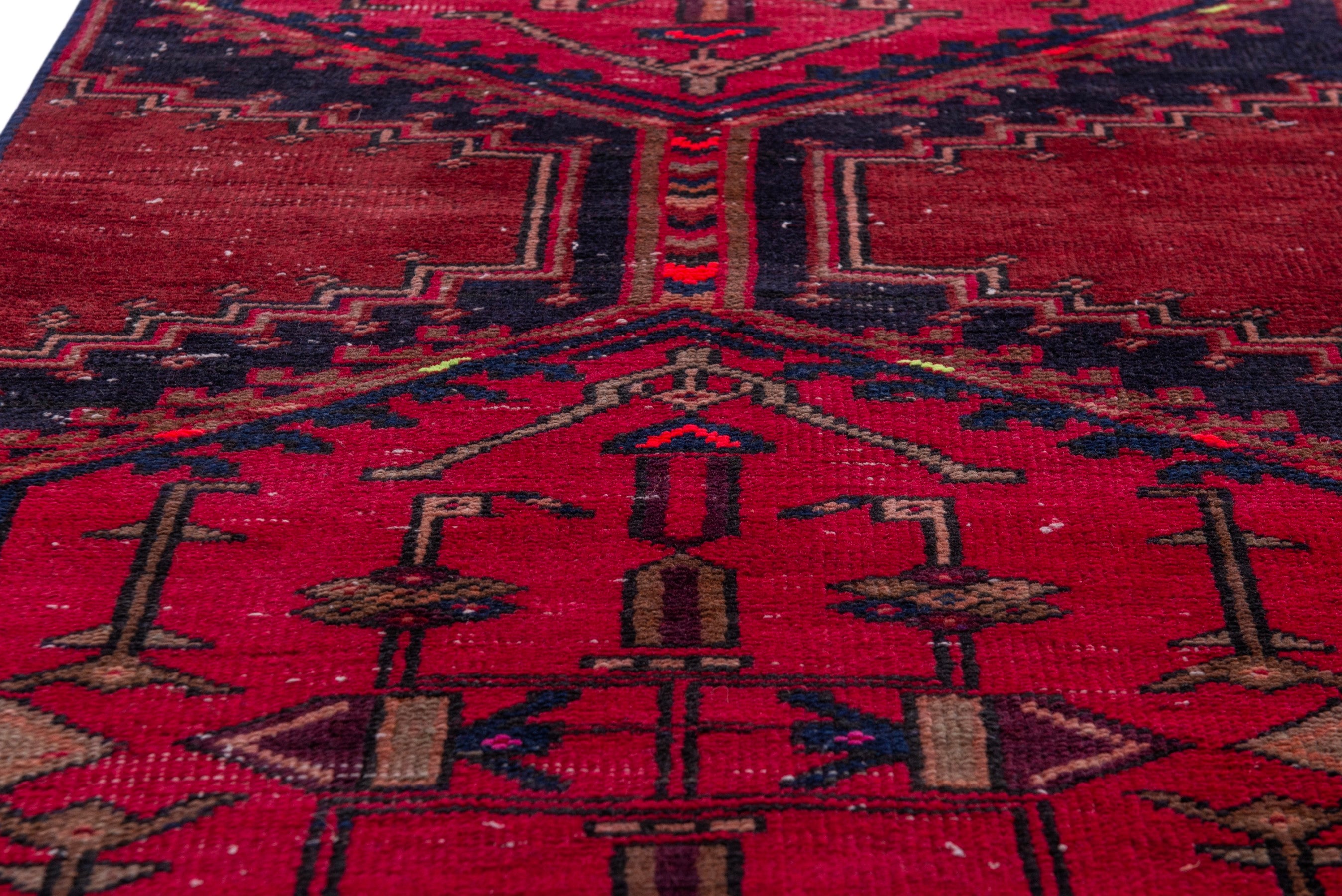 Persian Azerbaijan accent rug in deep red and dark blue, view 9 of 18
