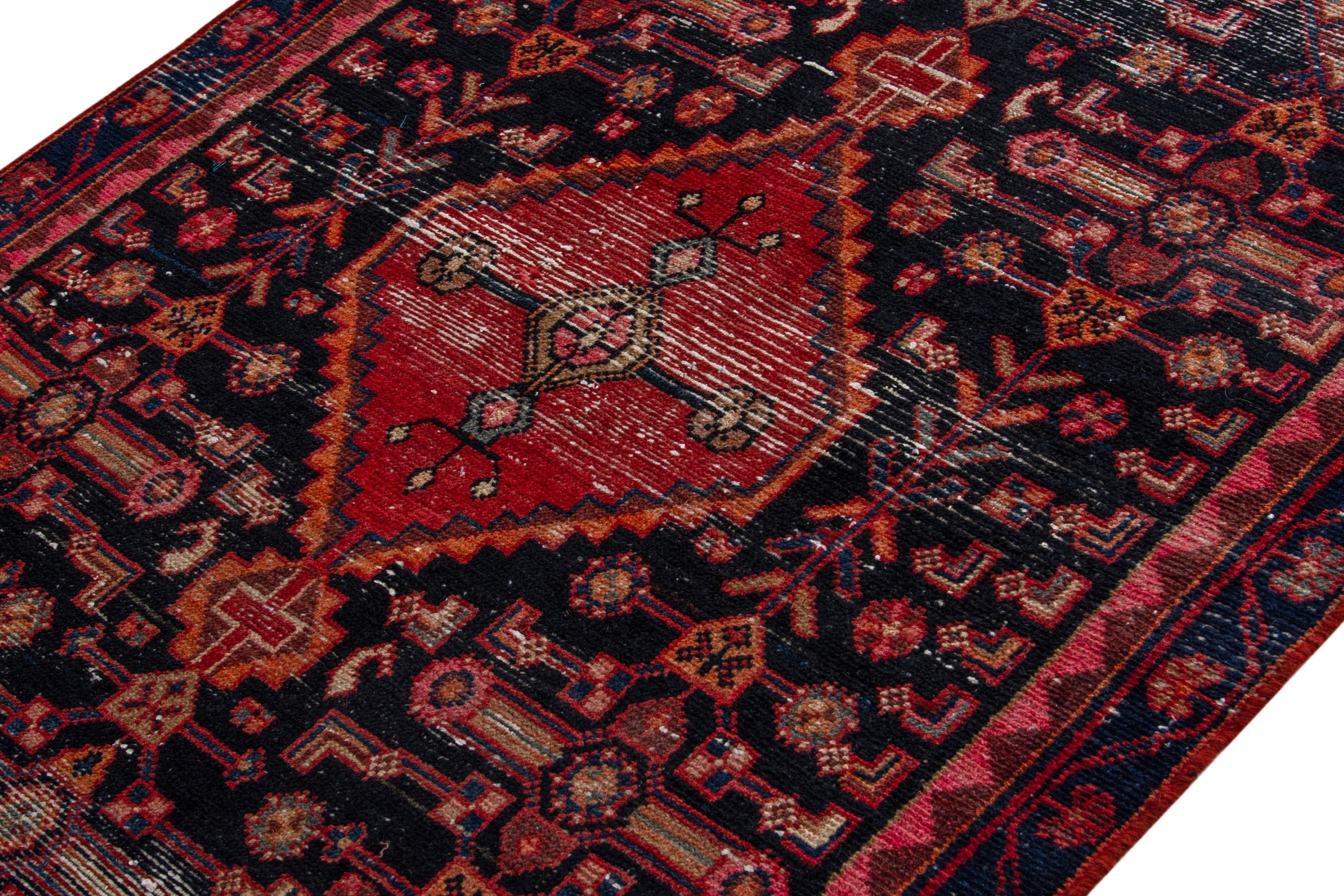 Persian Hamedan accent rug in navy and burgundy, view 4 of 17