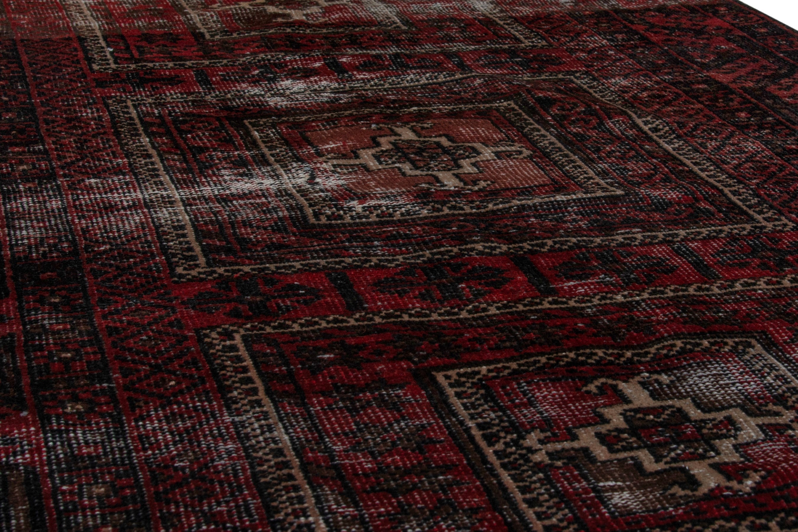 Persian Baluch runner rug in deep red and faded red, view 10 of 18