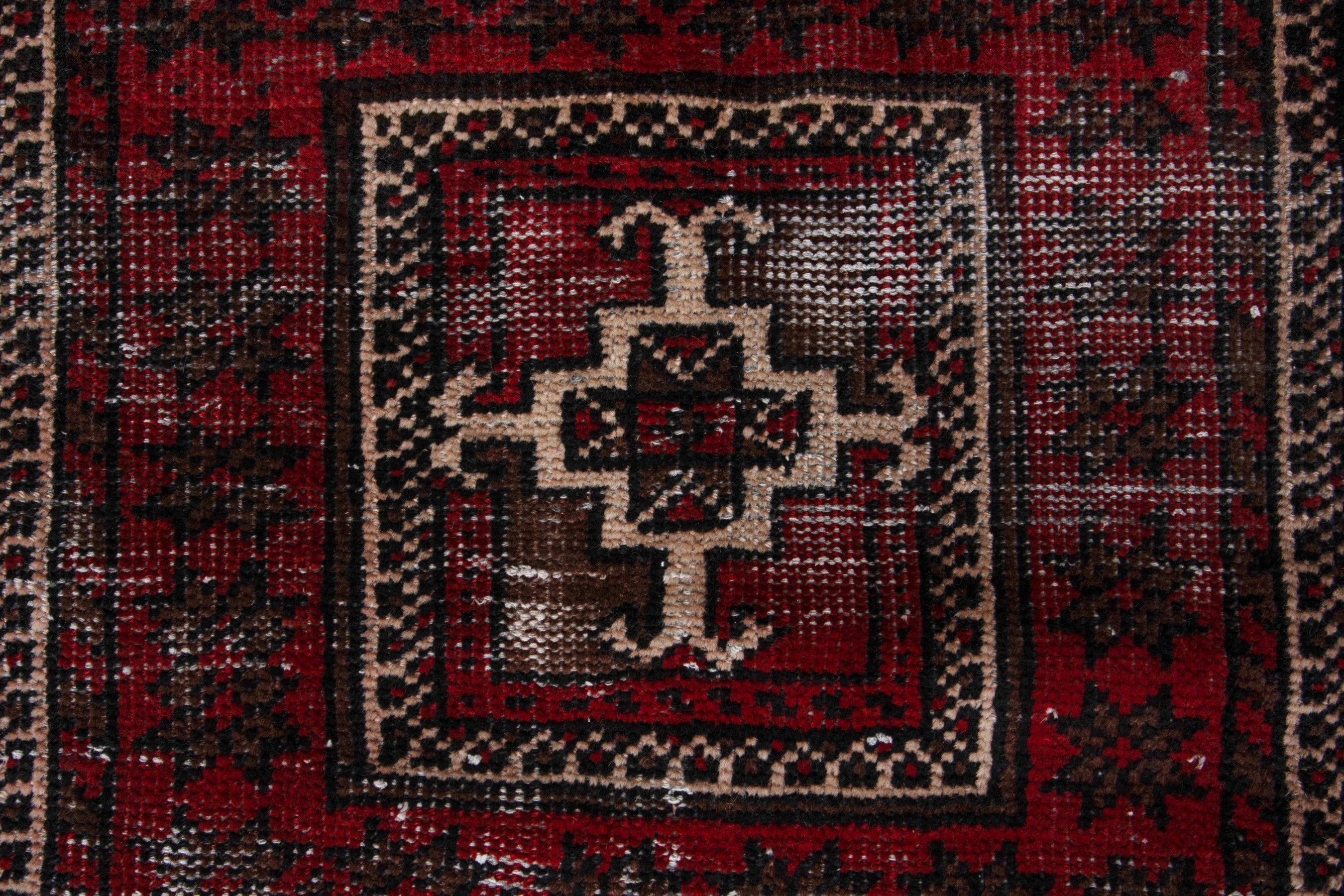 Persian Baluch runner rug in deep red and faded red, view 12 of 18