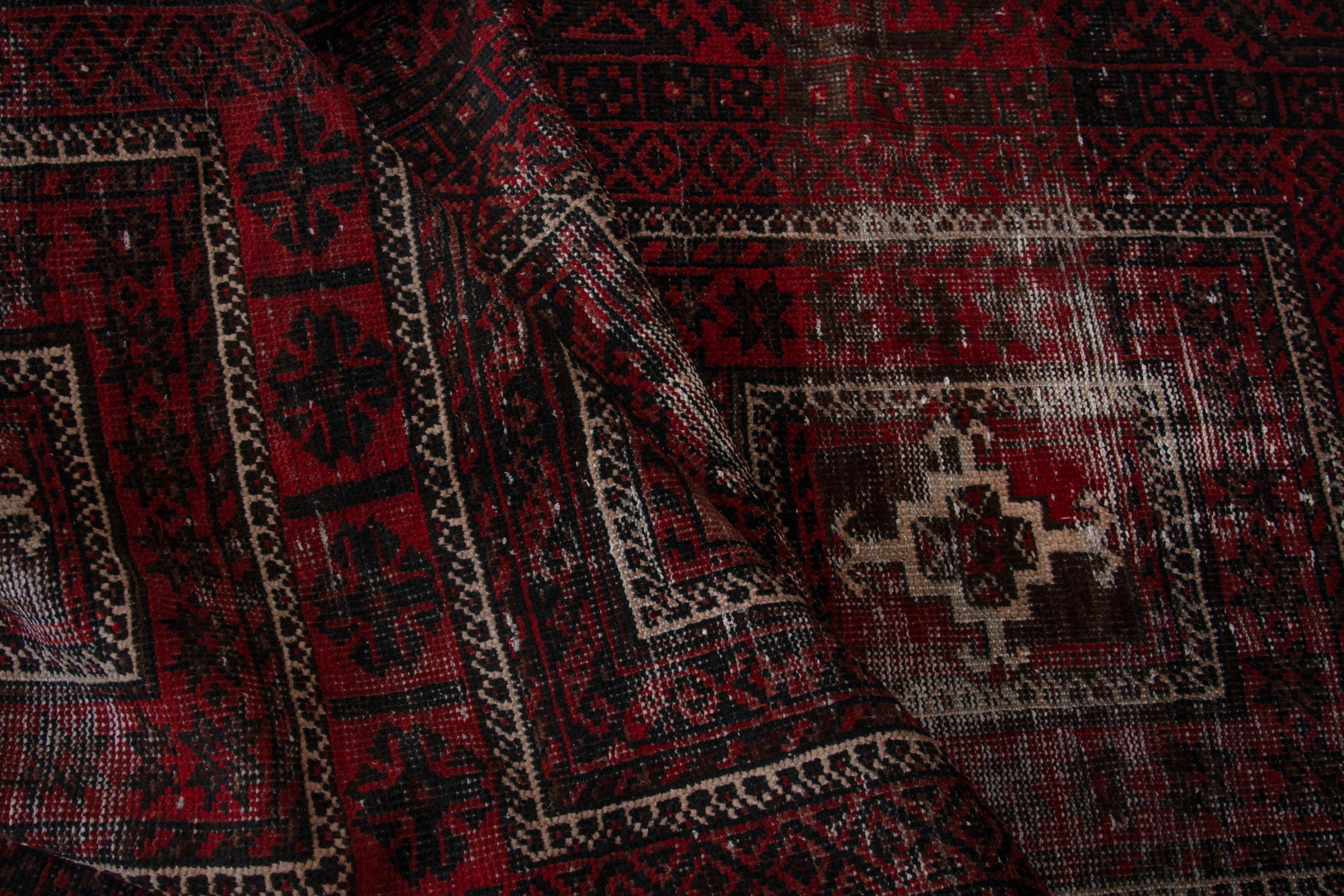 Persian Baluch runner rug in deep red and faded red, view 17 of 18