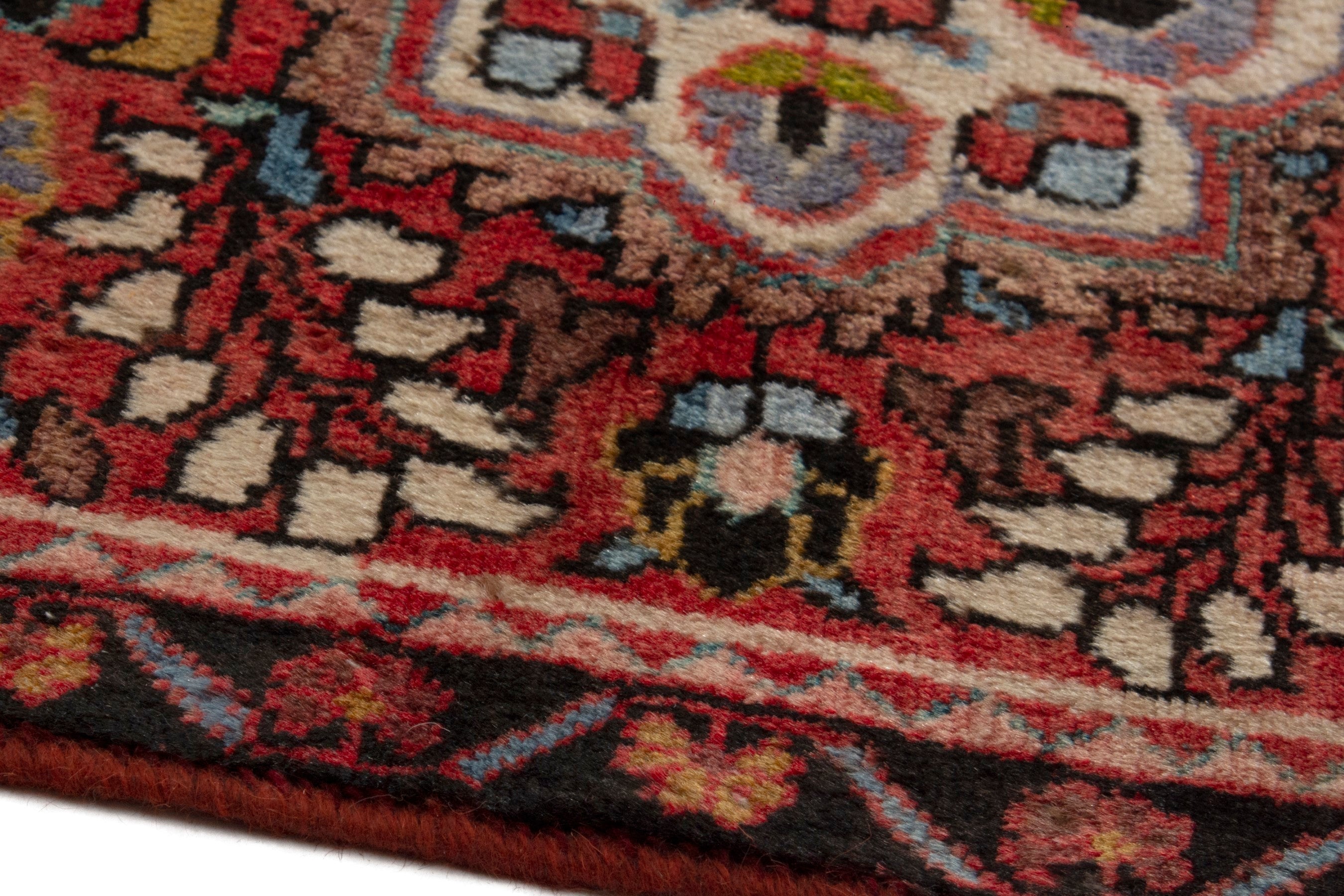 Persian Lilihan accent rug in deep red and burgundy, view 7 of 10