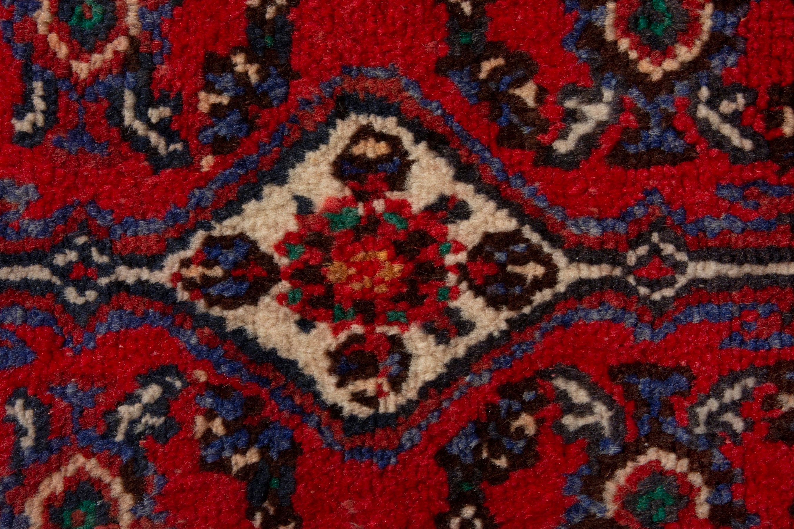 Persian Hamedan accent rug in deep red and navy, view 7 of 8