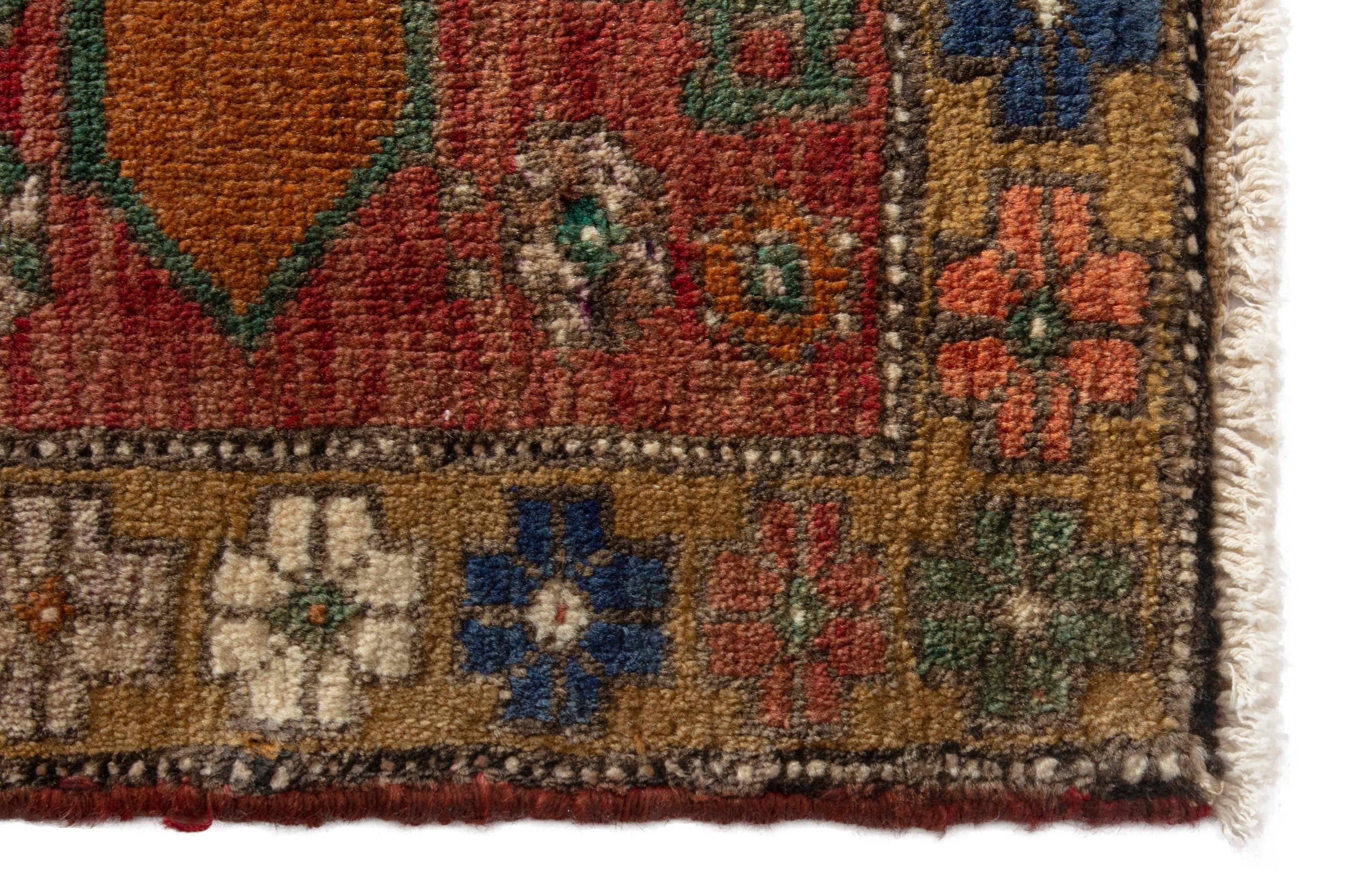 Persian Azerbaijan accent rug in rust and dark blue, view 4 of 8